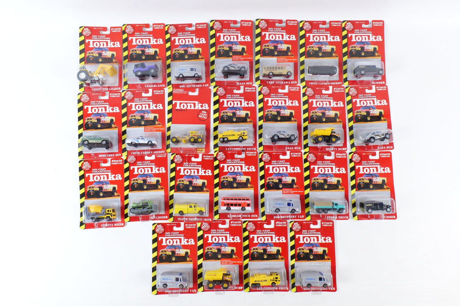 Lot of 25 Tonka Diecast Cars: Lot of 25 Tonka Diecast Cars. Including Chevy Caprice Sheriff, Daimler Tour Bus, LAX Command Truck, Front End Loader, Mercedes SUV, and More. All sealed in package. Packaging has some wear. All invoic