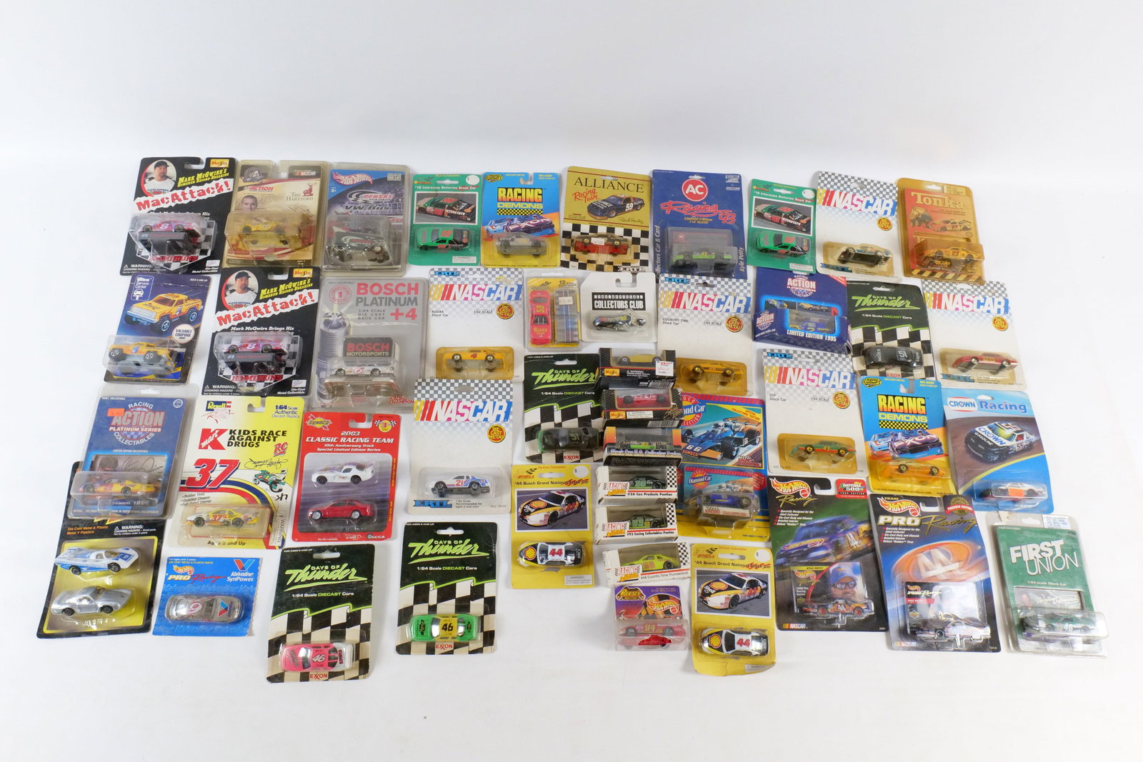 Large Lot of Mixed Diecast NASCAR: Large Lot of Mixed Diecast NASCAR. Including Maisto, Tonka, Hot Wheels Racing, Ertl NASCAR, Gas Station, Road Champs and More. All sealed in package. Packaging has some wear. All invoices must be paid