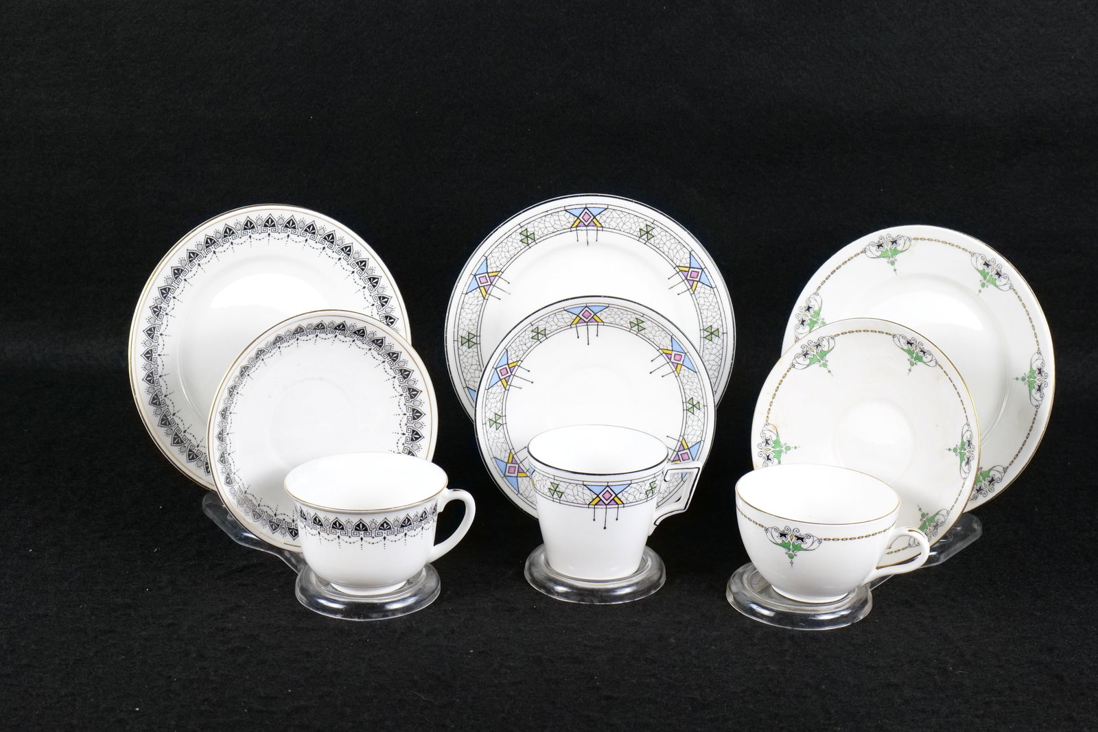 Lot of 3 Shelley Bone China Teacup Trios: Lot of 3 Shelley Bone China Teacup Trios. Including Kenneth Shape #11206 Black Border, Jewel and Chain #8910 Bute Shape, and Art Deco Diamonds and Triangles #11167 Victoria Shape. All Circa 1920's/30'