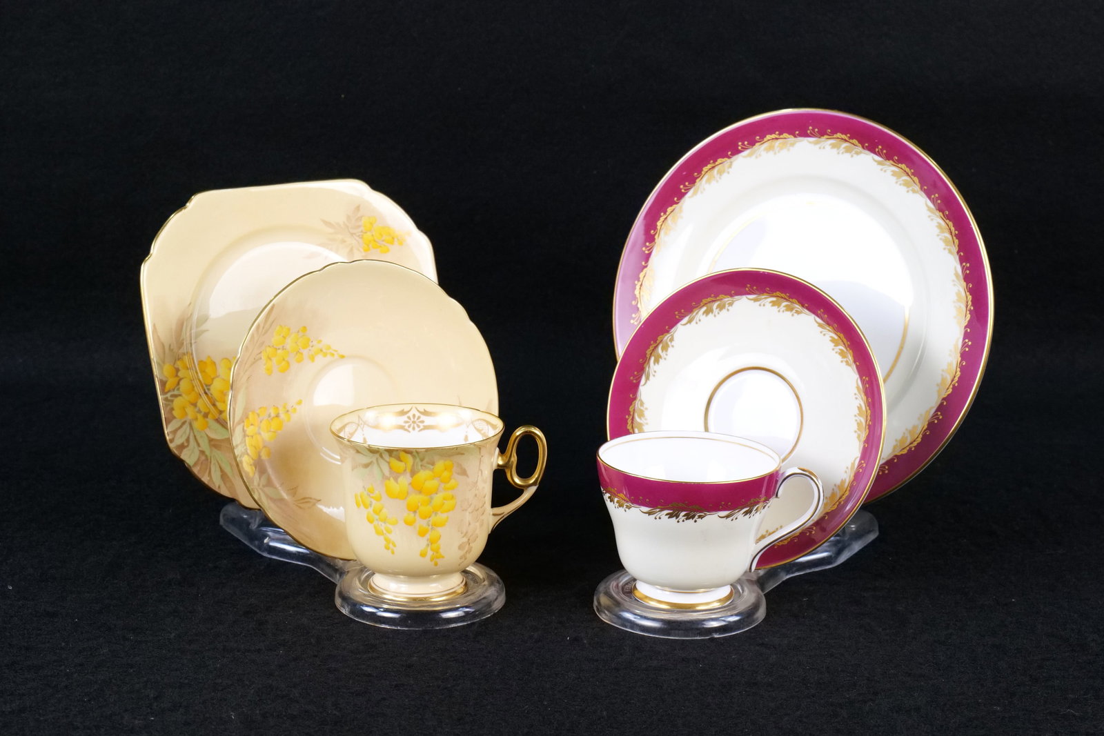 Lot of 2 Shelley Bone China Tea Trios: Lot of 2 Shelley Bone China Tea Trios. Including Acanthus Red #14133 Windsor Shaped Tea Trio - Circa 1962-1966 and Court Shaped Golden Laburnum #12432 - Circa 1935-1940. Largest plate measures 8". Thi
