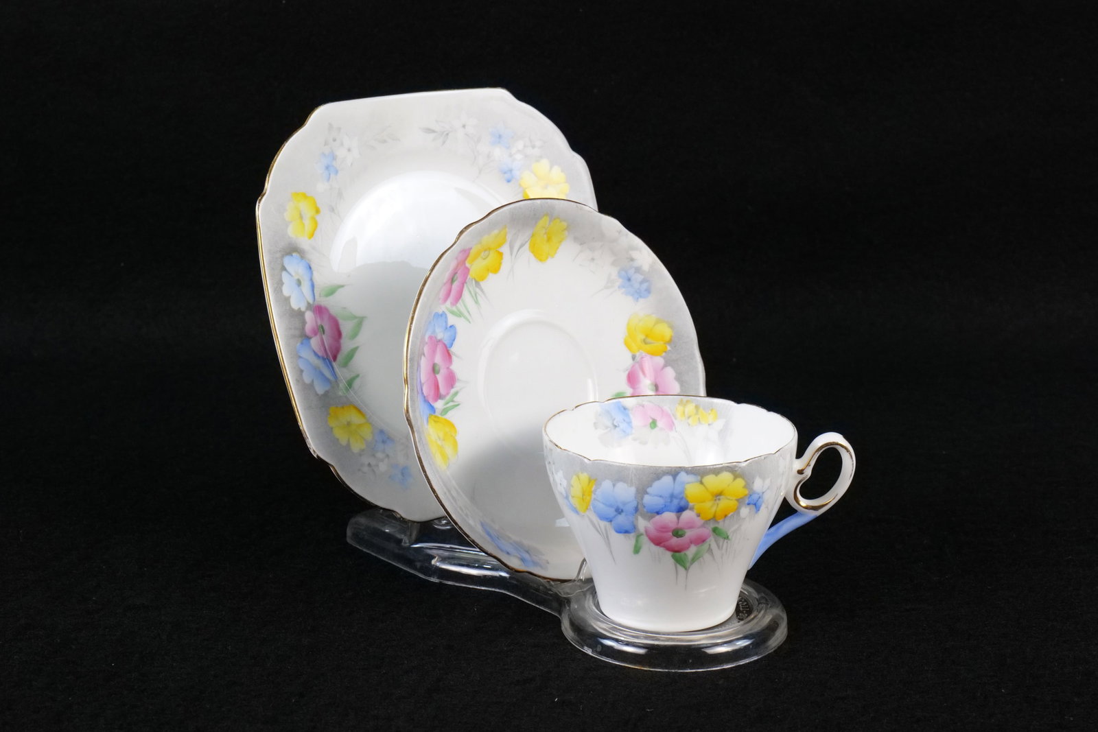 Vintage Shelley Poppies Tea Trio: Vintage Shelley Poppies Tea Trio. Pattern #233. Shape appears to be Cambridge. The book states Perth. Not sure on this. Rare Gray Color. Circa 1940's-60's. This Shelley Collection came from the Judy a