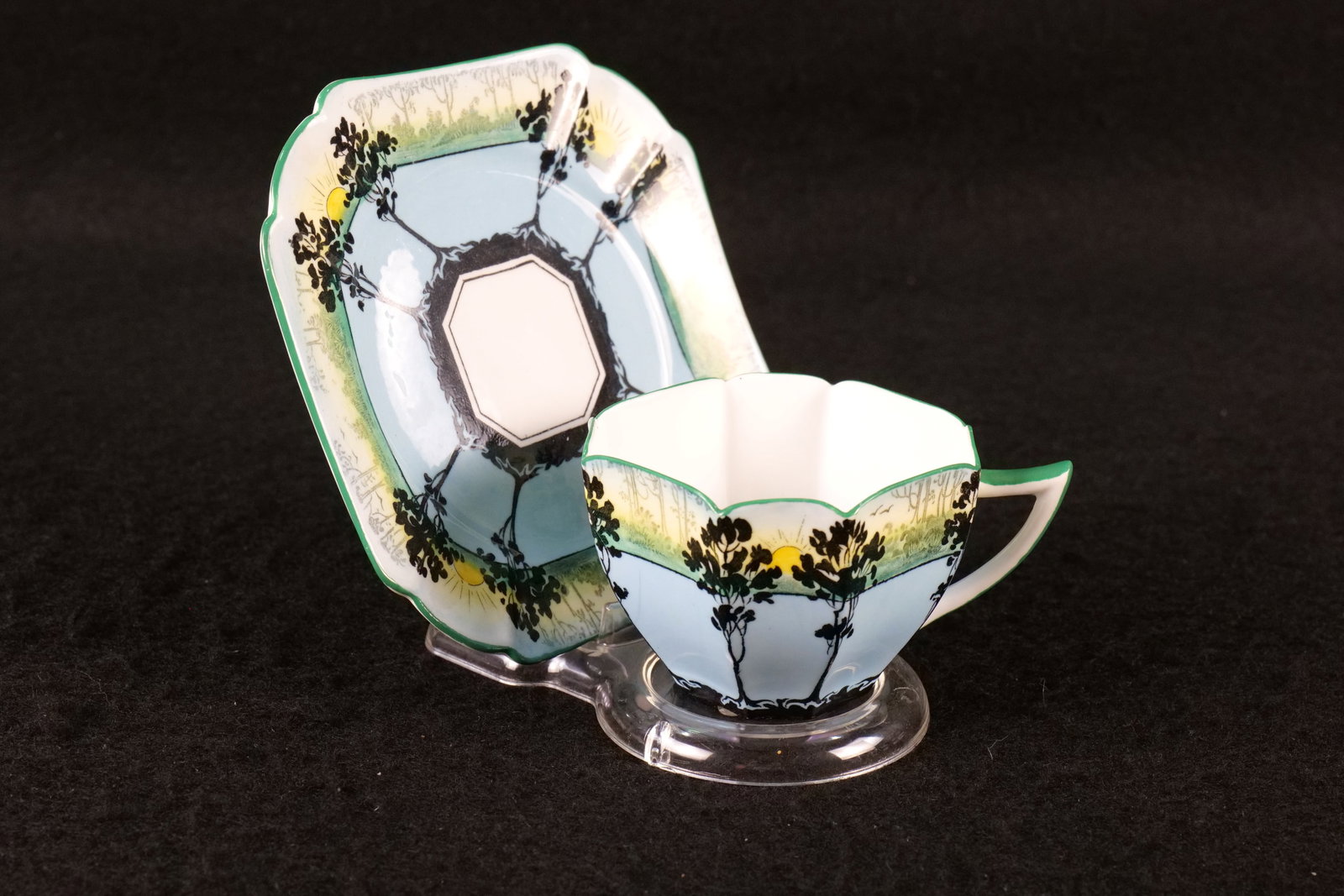 Shelley Queen Anne Trees and Sunset Teacup and Saucer: Shelley Queen Anne Trees and Sunset Teacup and Saucer. In Blue. Pattern #11514. Circa 1920's/30's. This Shelley Collection came from the Judy and Jerry Silverman Collection. Most of the collection was