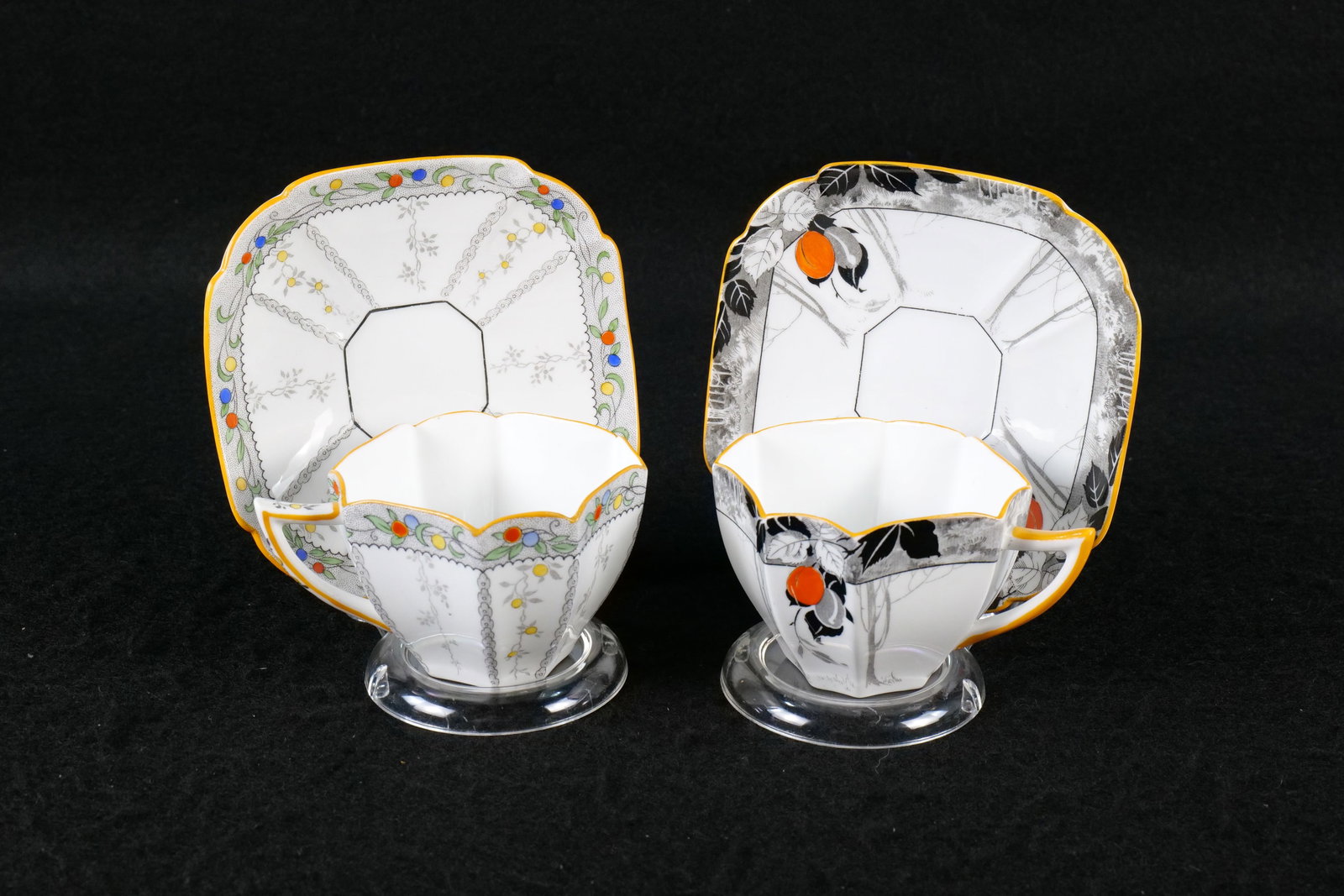 Lot of 2 Shelley Queen Anne Teacup and Saucer Sets: Lot of 2 Shelley Queen Anne Teacup and Saucer Sets. Including Fruit Border #11563 and Damsons #11632. Both are circa 1920's/30's. This Shelley Collection came from the Judy and Jerry Silverman Collect