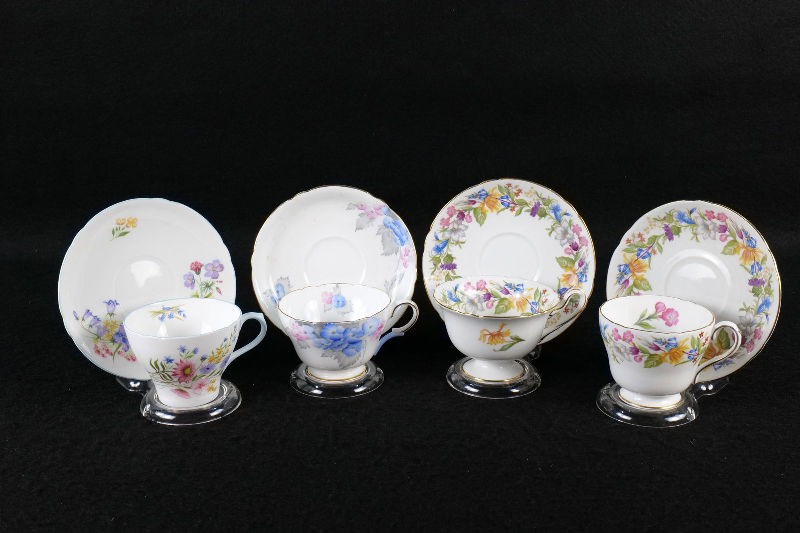 Lot of 4 Shelley Teacup and Saucer Duos: Lot of 4 Shelley Teacup and Saucer Duos. Including 2 Spring Bouquet #13651 in Gainsborough Shape and Richmond Shape, New Cambridge Wildflowers #13668, and Henley Blue Phlox #0170. This Shelley Collect