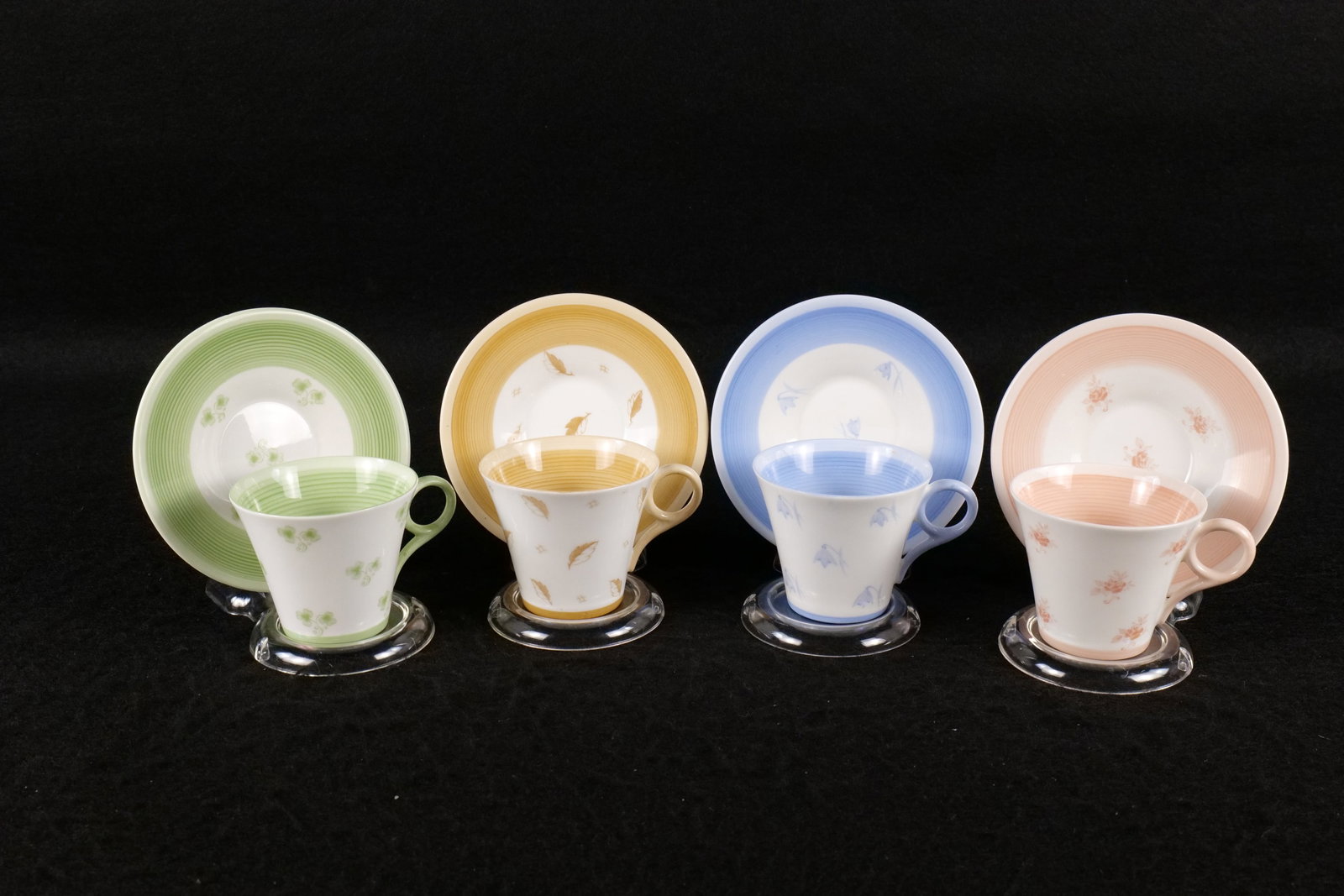Lot of 4 Shelley "Seasons" Teacups and Saucer Sets: Lot of 4 Shelley "Seasons" Teacups and Saucer Sets. Art Deco Regent Cup Shape. Including Spring #12563, Summer #12564, Autumn #12565, and Winter #12566. This Shelley Collection came from the Judy and 