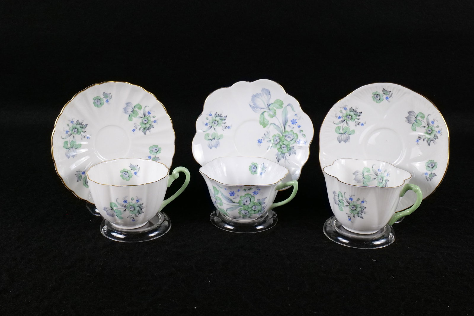 Lot of 3 Shelley "Green Iris" Teacup and Saucers: Lot of 3 Shelley "Green Iris" Teacup and Saucers. Pattern #2387. 2 Unmarked with Pattern #'s. Including Dainty, Ludlow, and Stratford. This Shelley Collection came from the Judy and Jerry Silverman Co