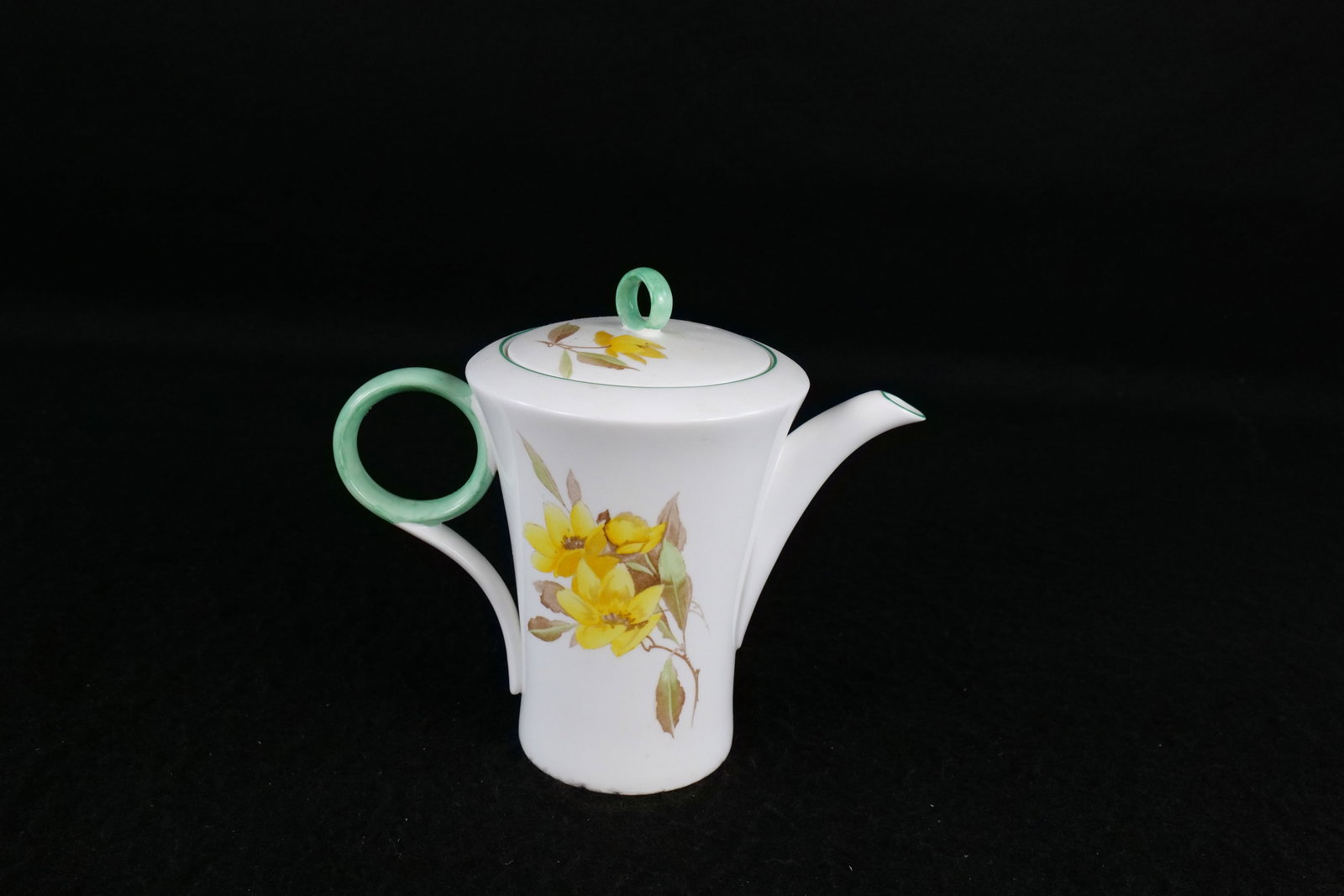 Shelley Art Deco "Syringa" Regent Shaped Coffee Pot: Shelley Art Deco "Syringa" Regent Shaped Coffee Pot. Pattern #12026. Green Accents. Measures 7.5" tall x 9" wide. This Shelley Collection came from the Judy and Jerry Silverman Collection. Most of the