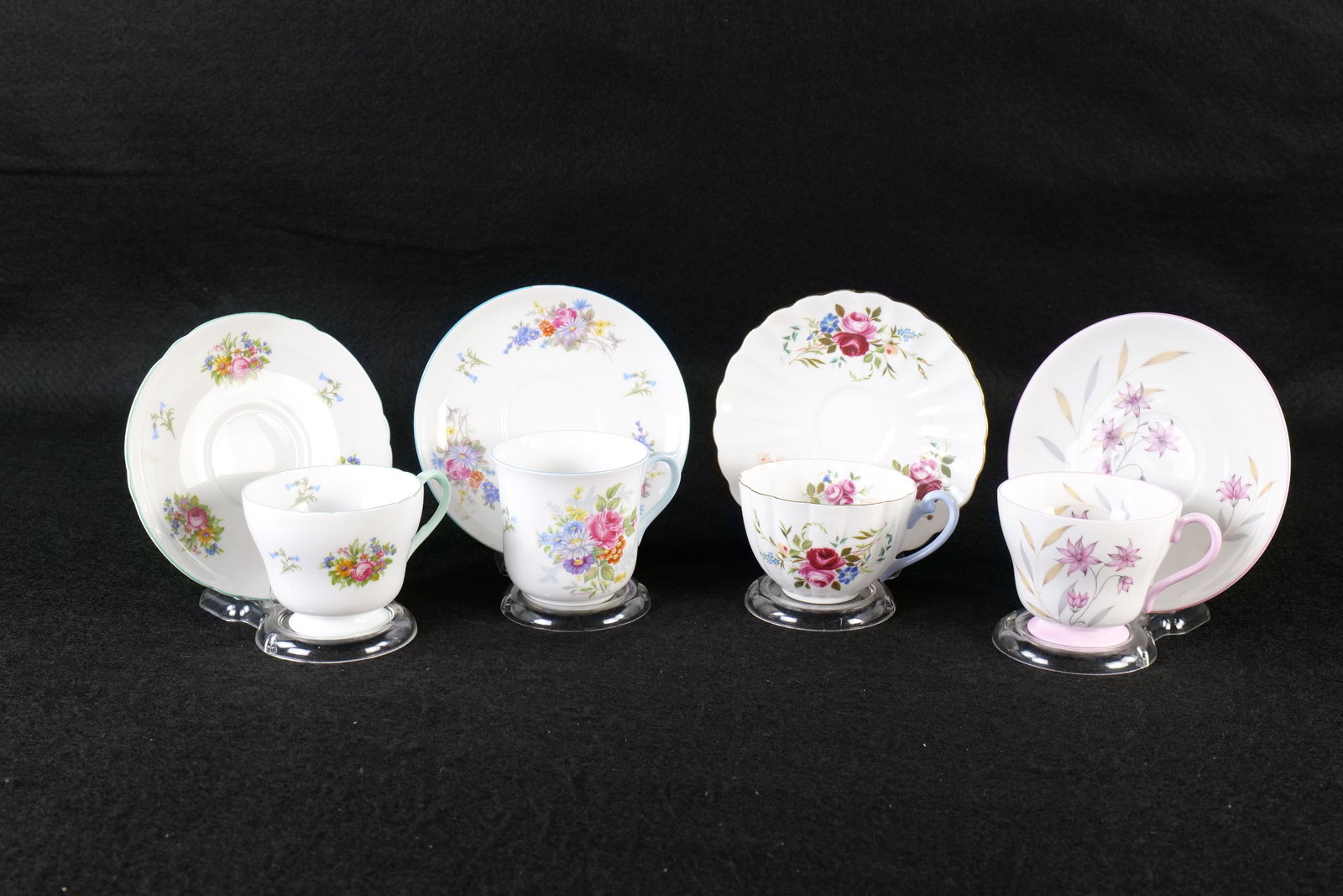 Lot of 4 Shelley Bone China Floral Teacups and Saucers: Lot of 4 Shelley Bone China Floral Teacups and Saucers. Including Vincent Floral - Pattern Unidentified, Ludlow "Debonair" #2407, Windsor Evening Star #2456, and Richmond Floral with Rose - Pattern Un