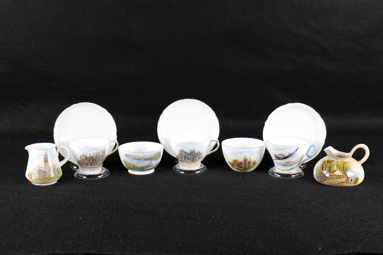 Lot of Shelley Souvenir Tea ware Items: Lot of Shelley Souvenir Tea ware Items. Including 2 x "St. Andrews Cathedral - Sydney N.S.W." Teacups and Saucers, "R.C.A.F. - Trenton Canada" Teacup and Saucer, "Lions Gate Bridge - Vancouver" Open S