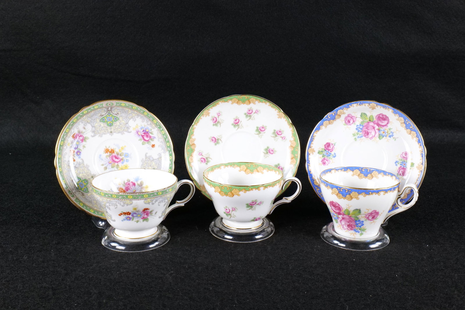Lot of 3 Shelley Teacups and Saucers: Lot of 3 Shelley Teacups and Saucers. Including Henley Rose sprays with Green Border #13671, Henley "Georgian" #13360, and Cambridge "Dark Rose" Blue Border #13473. This Shelley Collection came from t