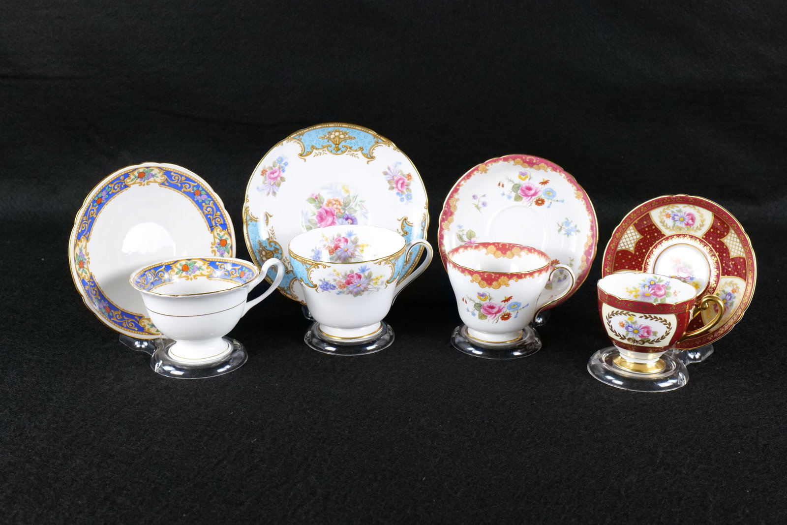 Lot of 4 Shelley Floral Teacups and Saucers: Lot of 4 Shelley Floral Teacups and Saucers. Including Richmond "Blue Empress" #14029, Richmond Unmarked Floral with Red Border, Unknown Pattern Gainsborough with Blue Border and Fruit, and Ripon "Mon