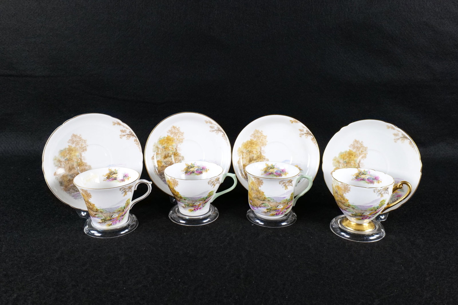 Lot of Shelley "Heather" Teacups and Saucers: Lot of Shelley "Heather" Teacups and Saucers. Cups shapes include Perth, Vincent, Ripon, and New Cambridge. Pattern #0187 and #13419. One Unmarked with Patten Number. This Shelley Collection came from