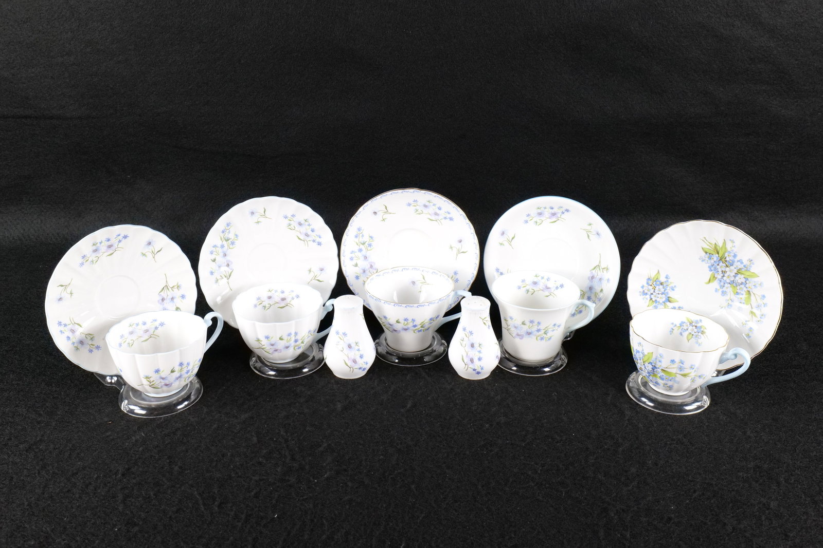 Lot of Shelley "Blue Rock" China Pieces: Lot of Shelley "Blue Rock" China Pieces. Including Salt and Pepper, Dorothy Cup and Saucer - Cup has a teeny tiny hairline crack, New Cambridge Cup and Saucer, and 3 Ludlow Cups and Saucers - One with