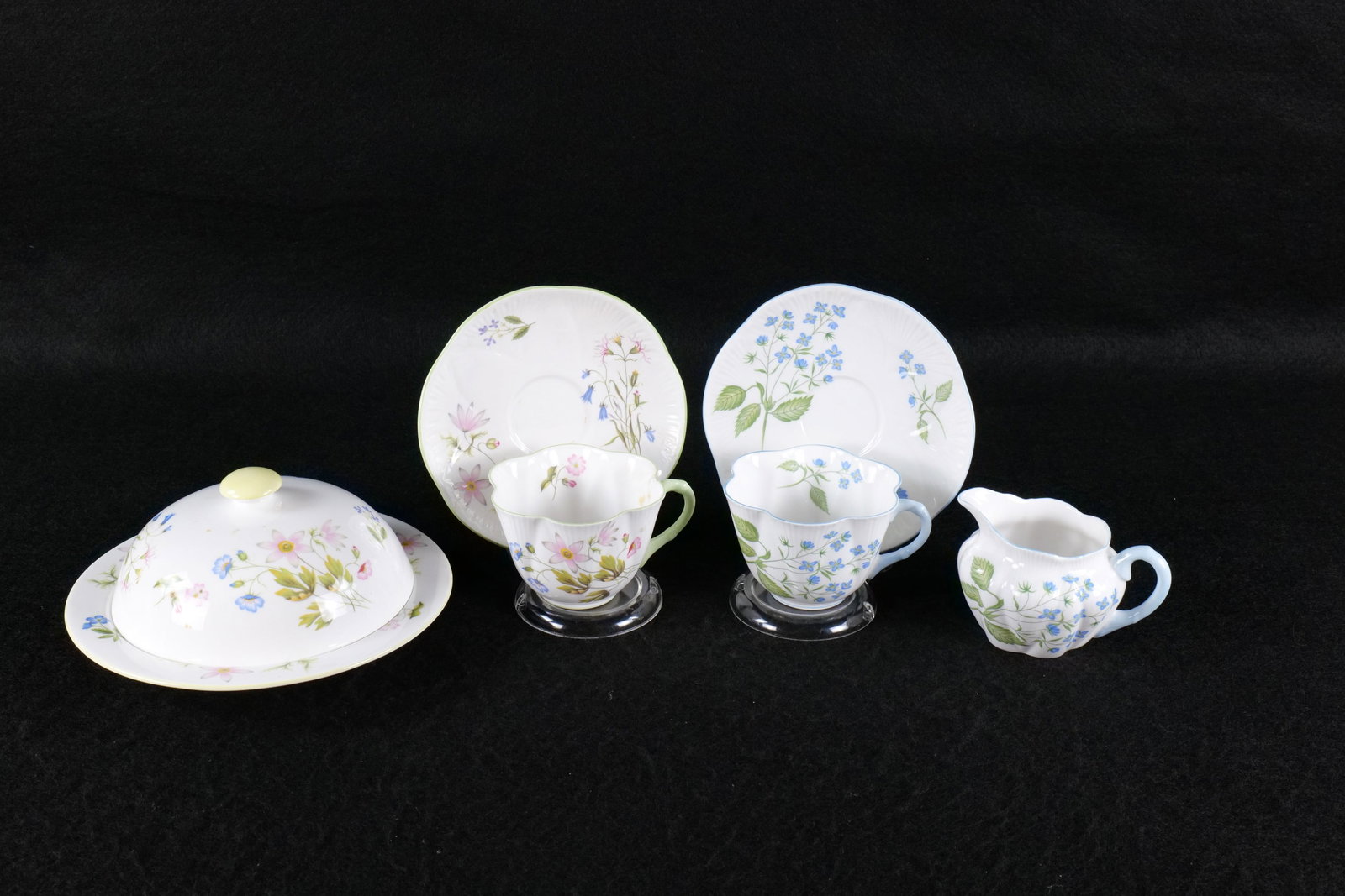 Lot of Shelley Bone China Tea ware Pieces: Lot of Shelley Bone China Tea ware Pieces. Including "Wild Anemone" Covered Dish with Yellow Accents #14163, Dainty "Wild Anemone" Teacup and Saucer #13977, Dainty "American Brooklime" Teacup and Sauc
