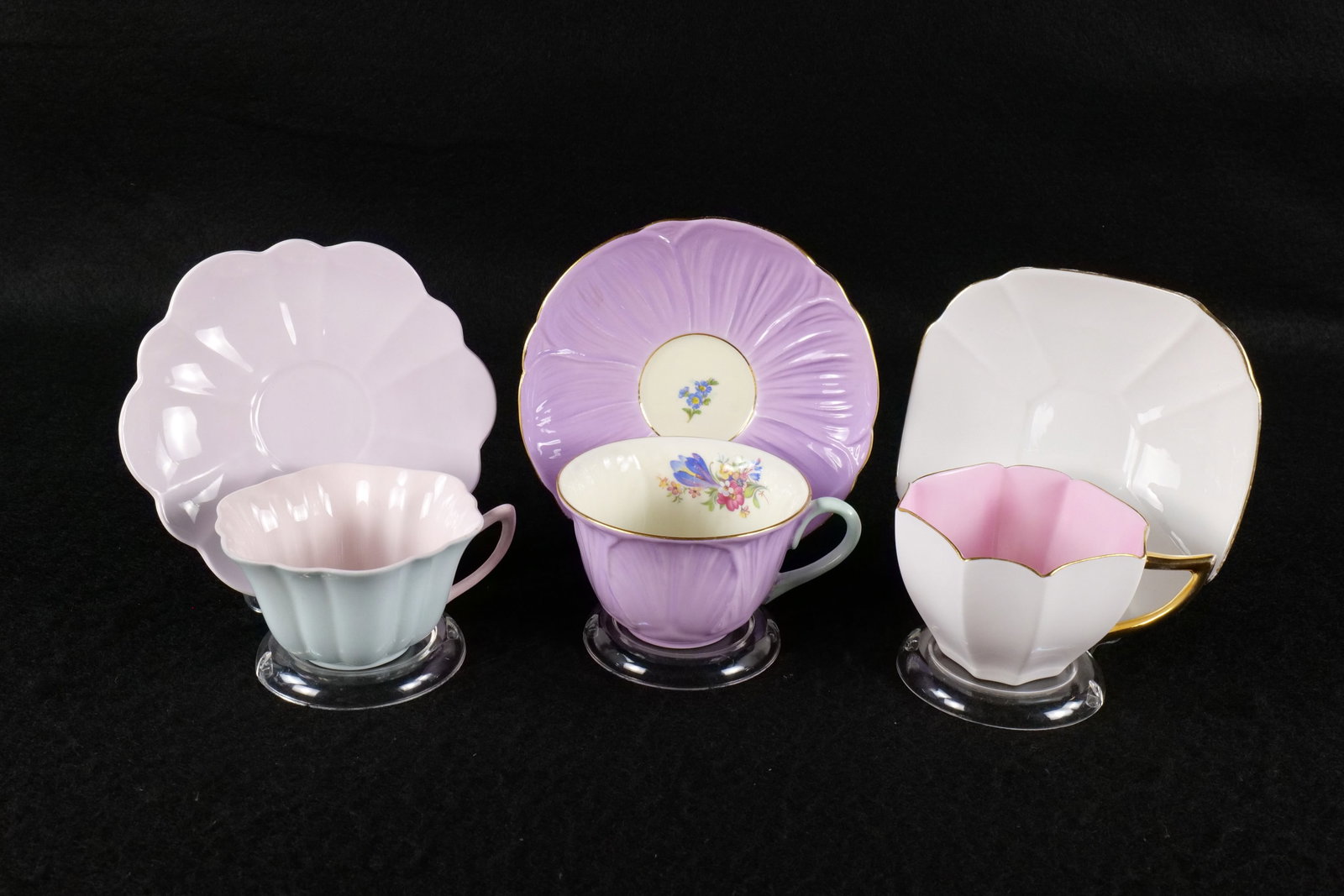 Lot of 3 Shelley Bone China Teacups and Saucers: Lot of 3 Shelley Bone China Teacups and Saucers. Including Queen Anne White with Dark Pink in Center - Unknown Pattern Number, Stratford Pale Green and Light Pink Cup with Lilac Saucer - Cup is patter