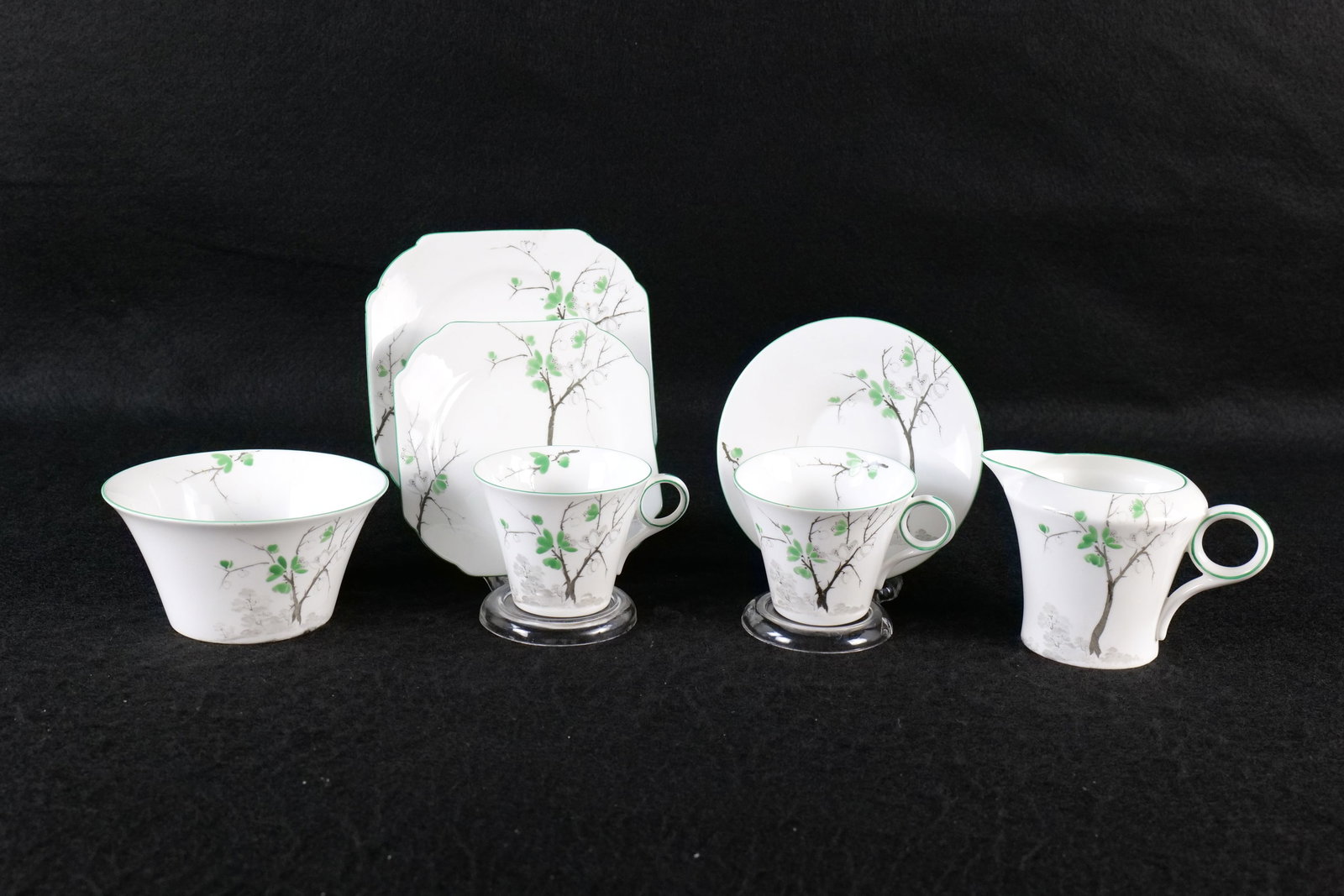 Shelley "Gorse" Bone China Tea ware Items: Shelley "Gorse" Bone China Tea ware Items. Including Regent Creamer and Sugar, 2 Octagonal Underplates, Regent Cup and Round Saucer, and Extra Regent Cup. Creamer measures 3.5" tall. This Shelley Coll