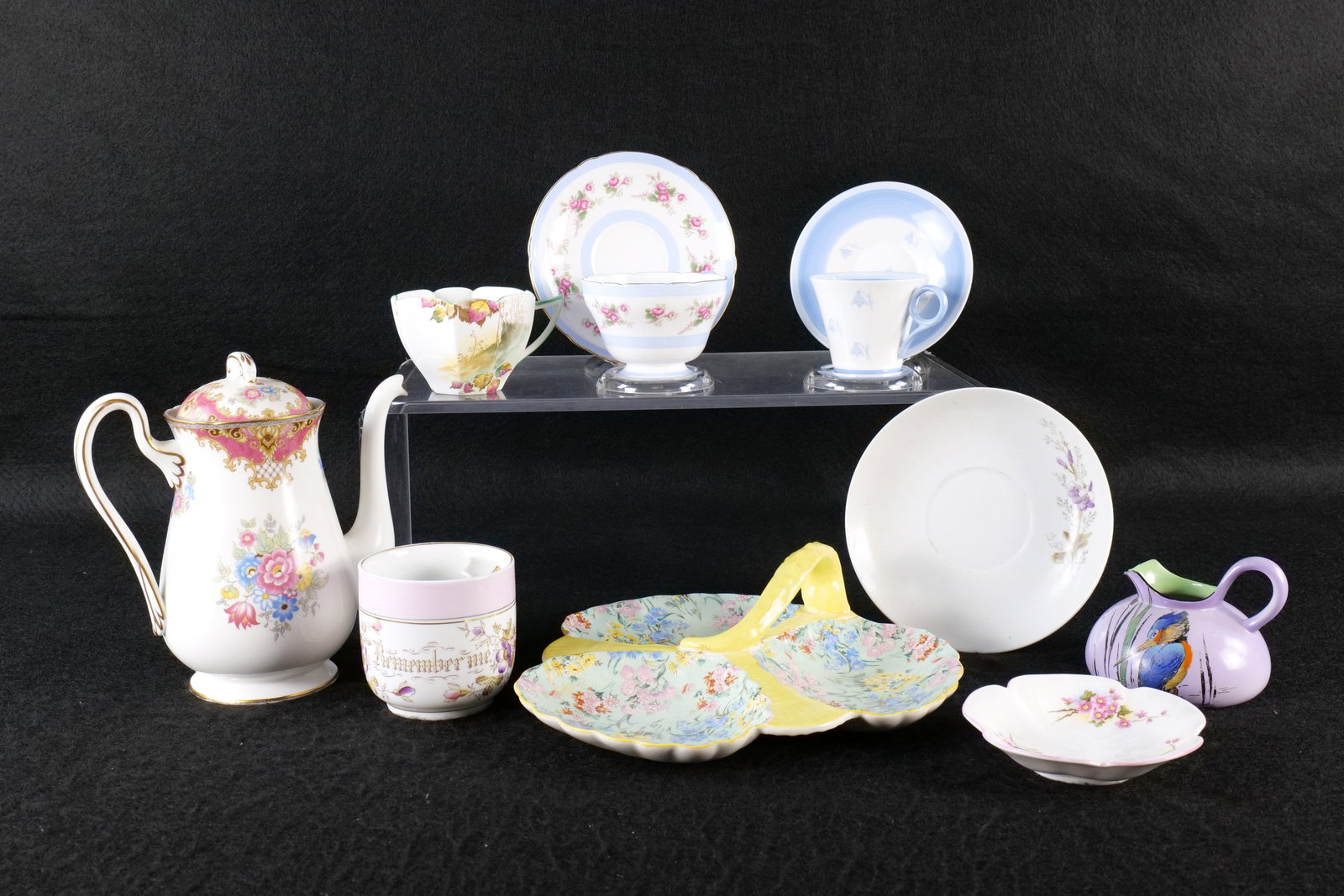 Lot of AS-IS Shelley Bone China Pieces: Lot of AS-IS Shelley Bone China Pieces. Including Teapot, Teacups and Saucers, Pottery Pitcher, and More. Everything in this lot is AS-IS. This Shelley Collection came from the Judy and Jerry Silverma
