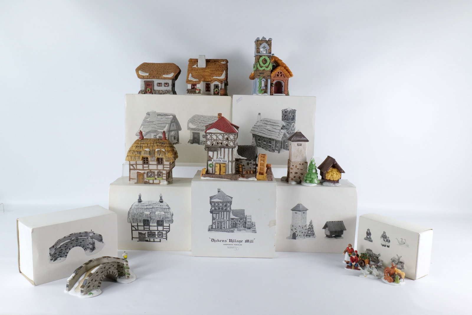 Lot of 7 Dept. 56 Dickens Village Houses and Accessories: Lot of 7 Dept. 56 Dickens Village Houses and Accessories. Including Houses: Barley Bree Farmhouse & Barn, Thatched Roof Cottage, Ivy Glen Church, and Dickens Village Mill. Accessories include Hay Barn