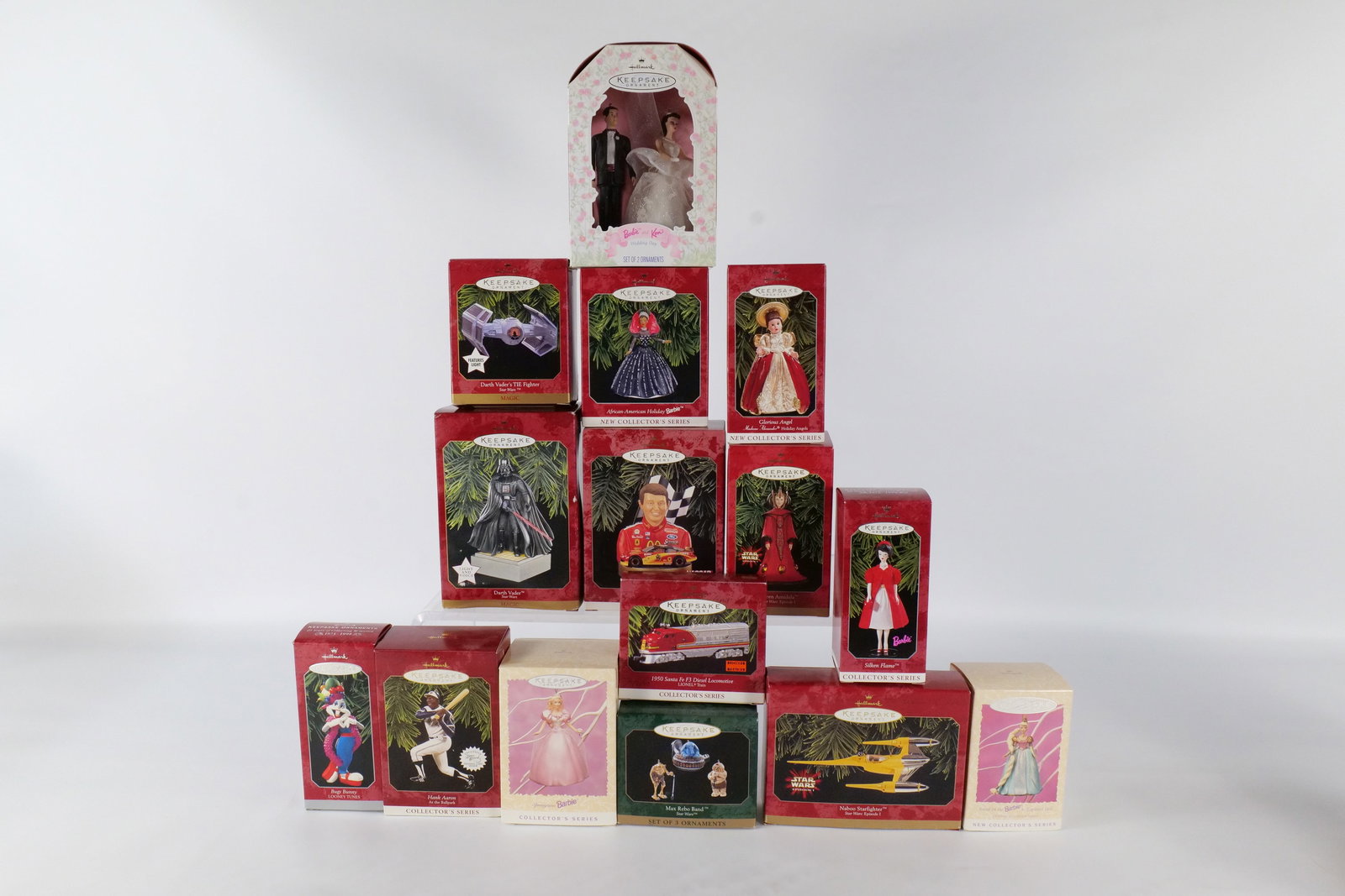 Lot of 15 Hallmark Ornaments: Lot of 15 Hallmark Ornaments. Including Barbie, Madame Alexander, Star Wars, and NASCAR. All invoices must be paid within 24 hours of the sale. We offer multiple shipping options, please read the ship