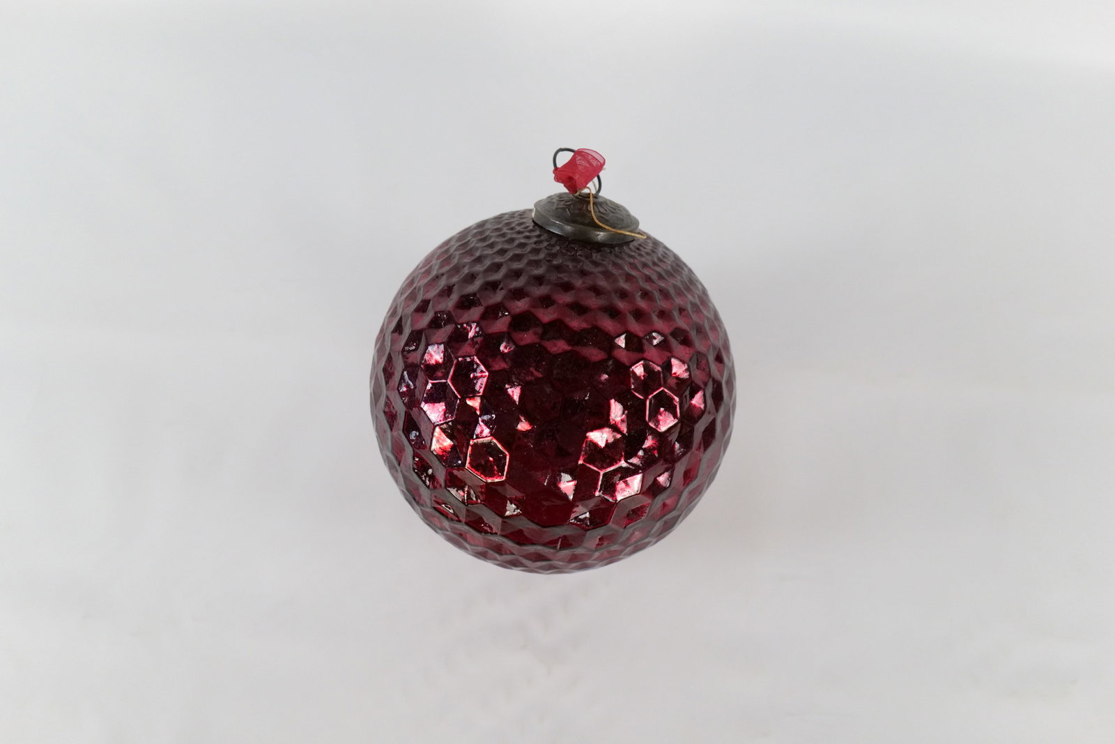 Vintage Style Glass Kugel Ornament in Honeycomb Pattern: Vintage Style Glass Kugel Ornament in Honeycomb Pattern. Made in India. Measures 10.5" tall x 9" wide. All invoices must be paid within 24 hours of the sale. We offer multiple shipping options, please