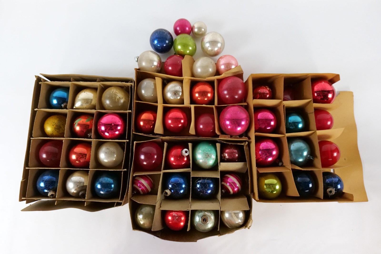 Lot of Vintage Christmas Ornaments: Lot of Vintage Christmas Ornaments. Includes some vintage boxes. Unsure if ornaments are original to boxes. Some have chips by the rim. Some spotting, crackle, missing caps, and loss to paint. All inv