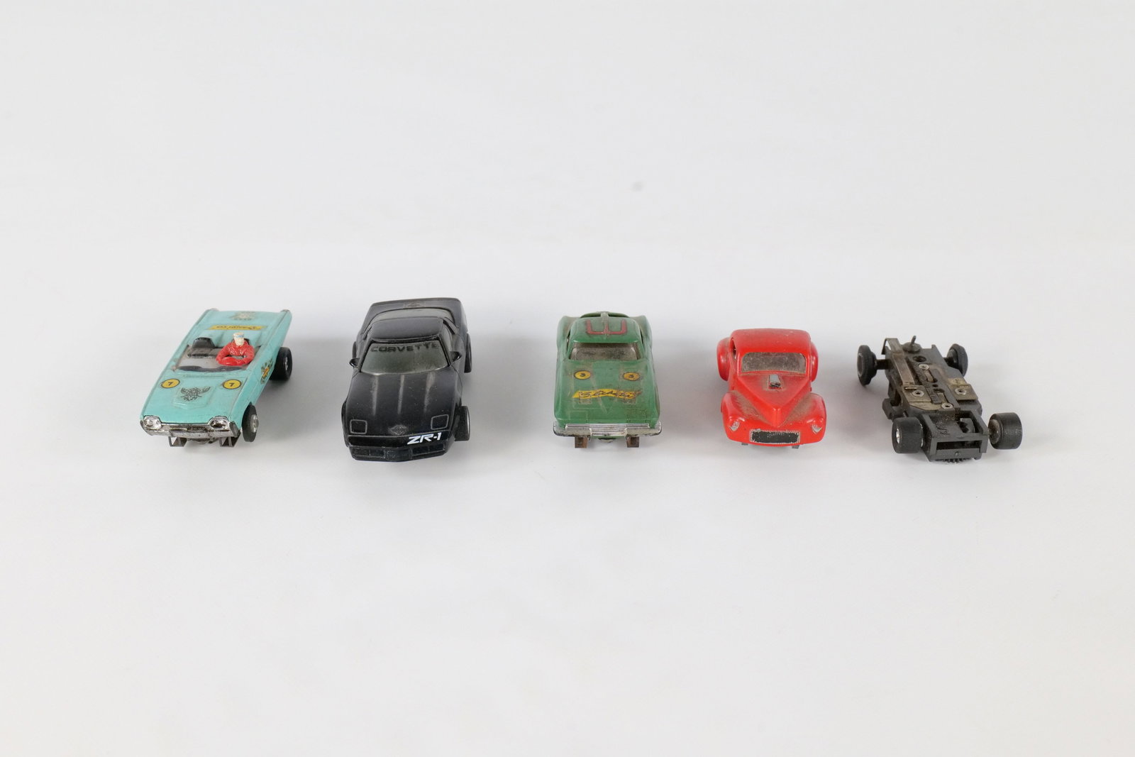 Lot of Slot Cars: Lot of Slot Cars. Including Bandito Car, Corvette, and More. Includes an extra bottom - missing wheels. All invoices must be paid within 24 hours of the sale. We offer multiple shipping options, pleas