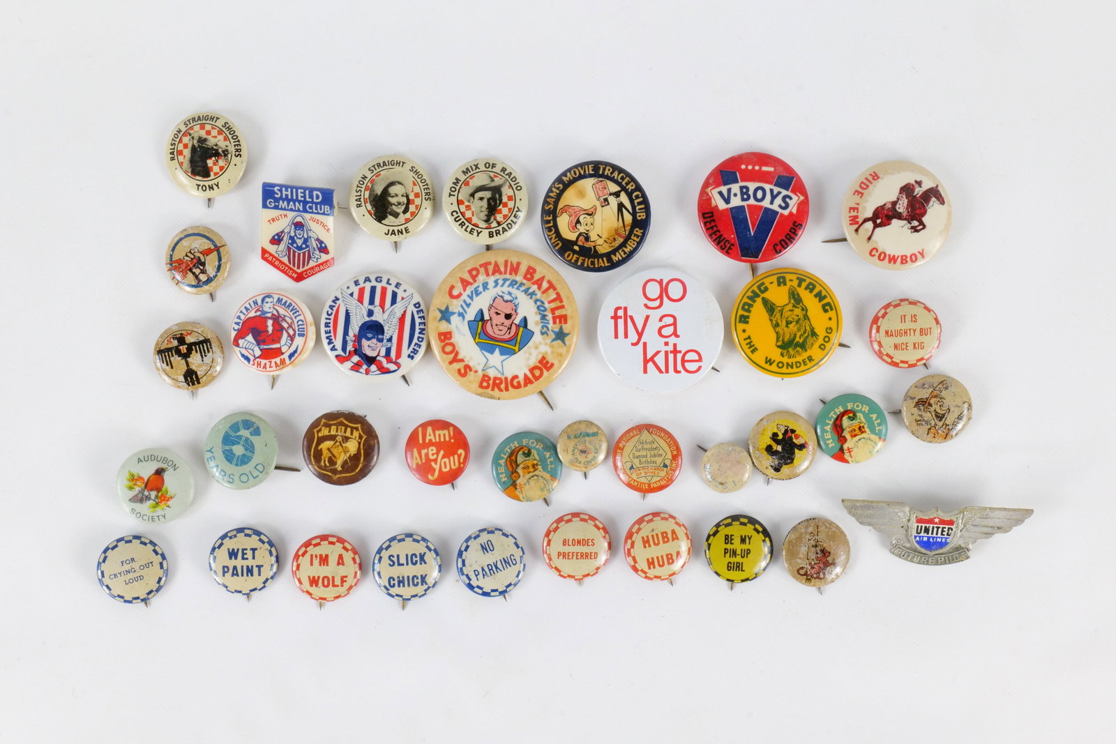 Lot of Vintage Pins: Lot of Vintage Pins. Including Captain Battle, G Man Club, United Airlines, American Eagle Defenders, Orangutang Wonder Dog, Shazam and More. Some has missing paint, discoloration, and corrosion. See 
