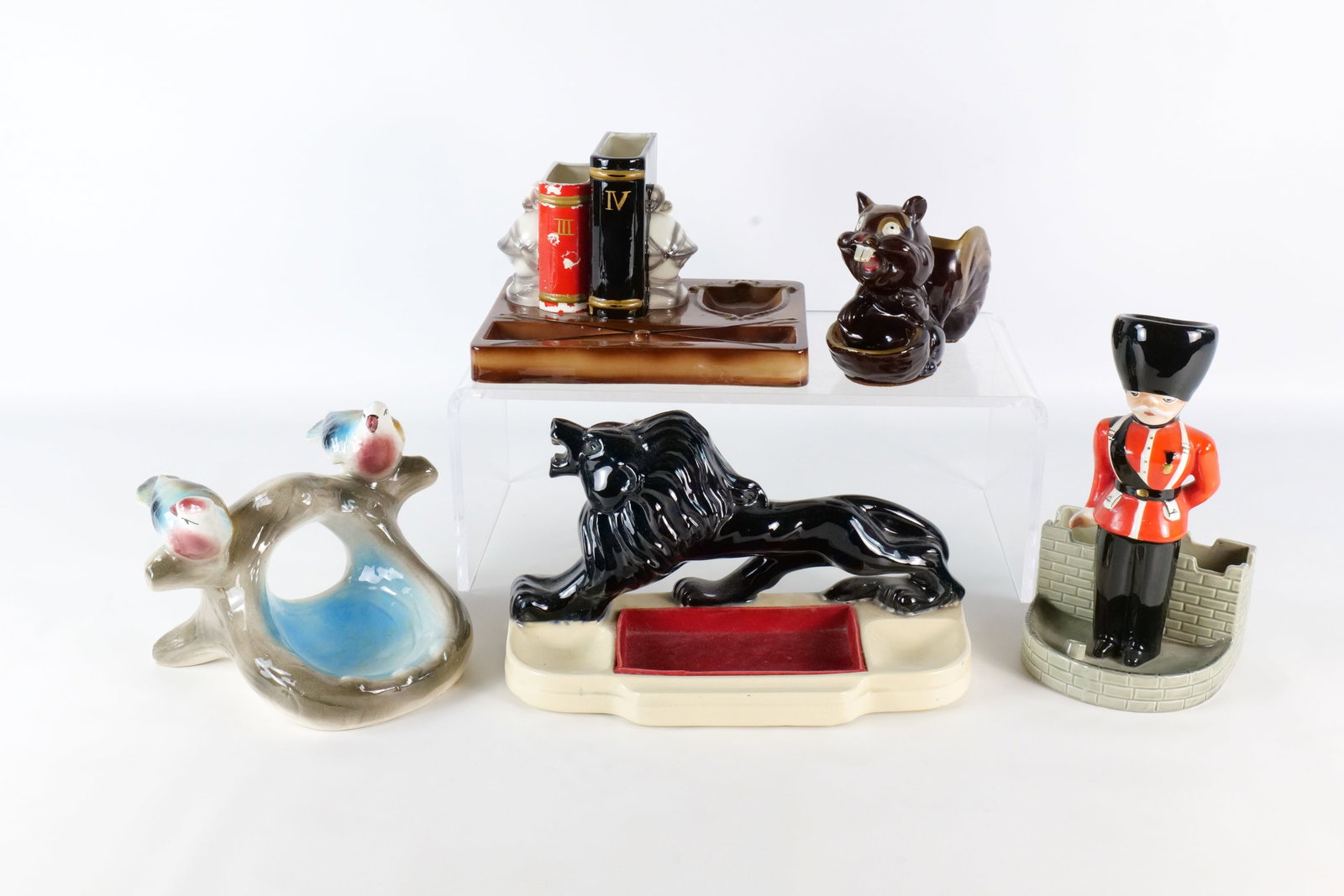 Lot of 5 Ceramic Valet Trays/Trinket Holders: Lot of 5 Ceramic Valet Trays/Trinket Holders - Circa 1950's. Including McCoy, Swank, Made in Japan, Made in Mexico and Unmarked. Some have chipping and paint loss. Largest measures 9.5" tall. All invo