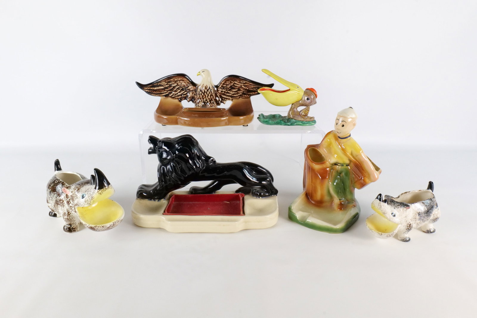 Lot of 6 Ceramic Valet Trays/Trinket Holders/Small Planters: Lot of 6 Ceramic Valet Trays/Trinket Holders/Small Planters - Circa 1950's. Including Caddie Laddie by Jerk Socks, Marked Japan, and others unmarked. Some have chipping and paint loss. Largest measure