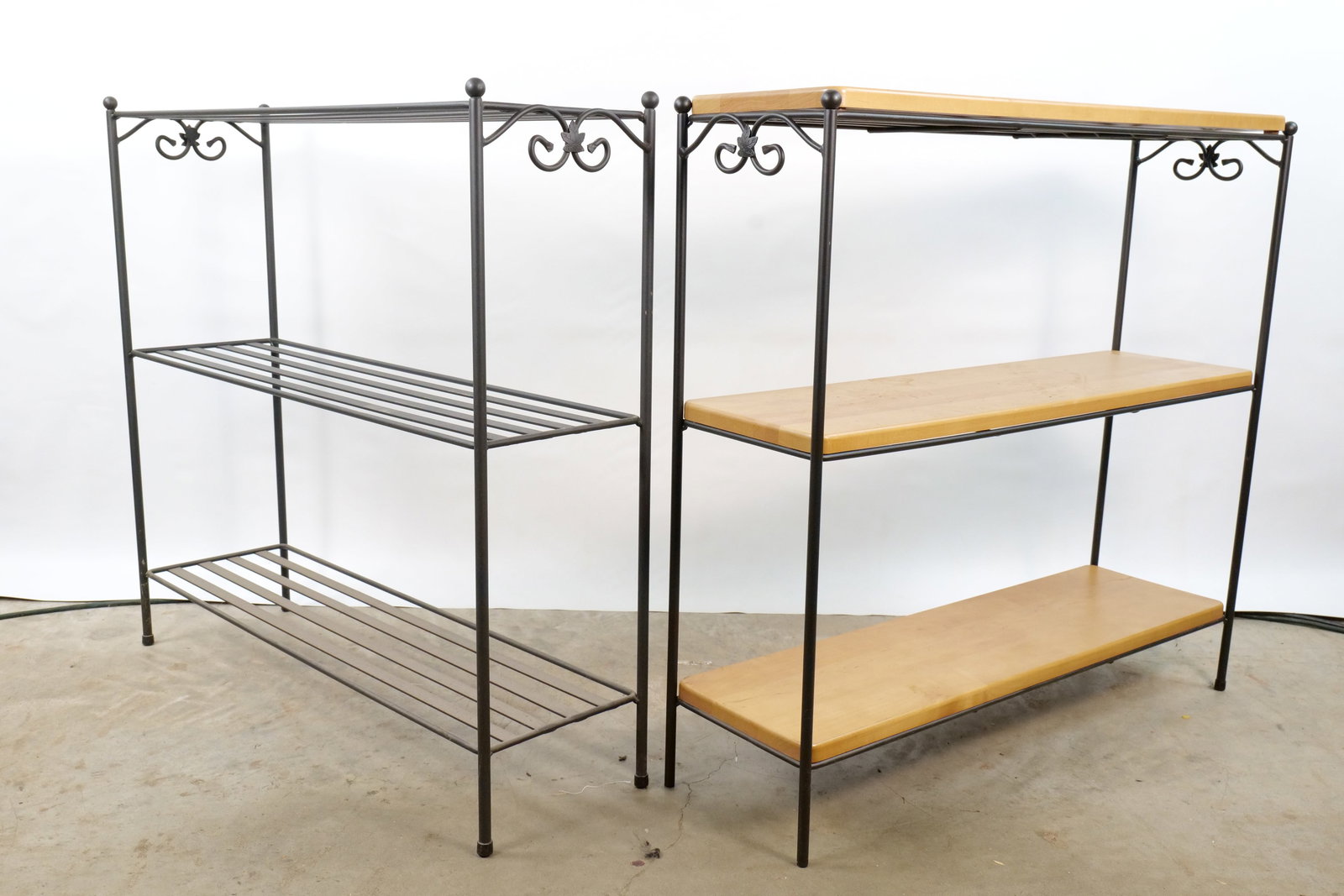 Pair of Longaberger Shelves: Pair of Longaberger Black Wrought Iron Shelves. Comes with 3 Wooden Pieces. Measures 30.75" tall x 32.5" wide x 9.5" deep. All invoices must be paid within 24 hours of the sale. We offer multiple ship