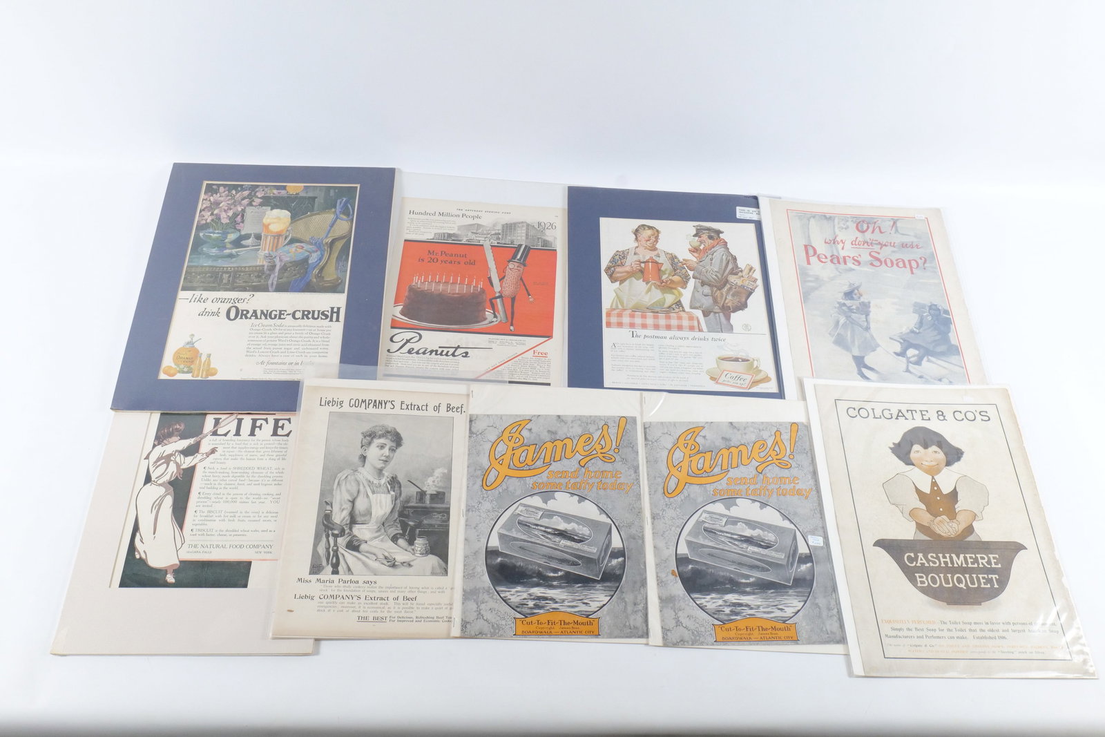 Lot of Vintage Ads: Lot of Vintage Ads. Including Pear's Soap, Natural Food Company, James Bros Taffy, Colgate, Orange Crush and More. Some discoloration and tears. All invoices must be paid within 24 hours of the sale. 