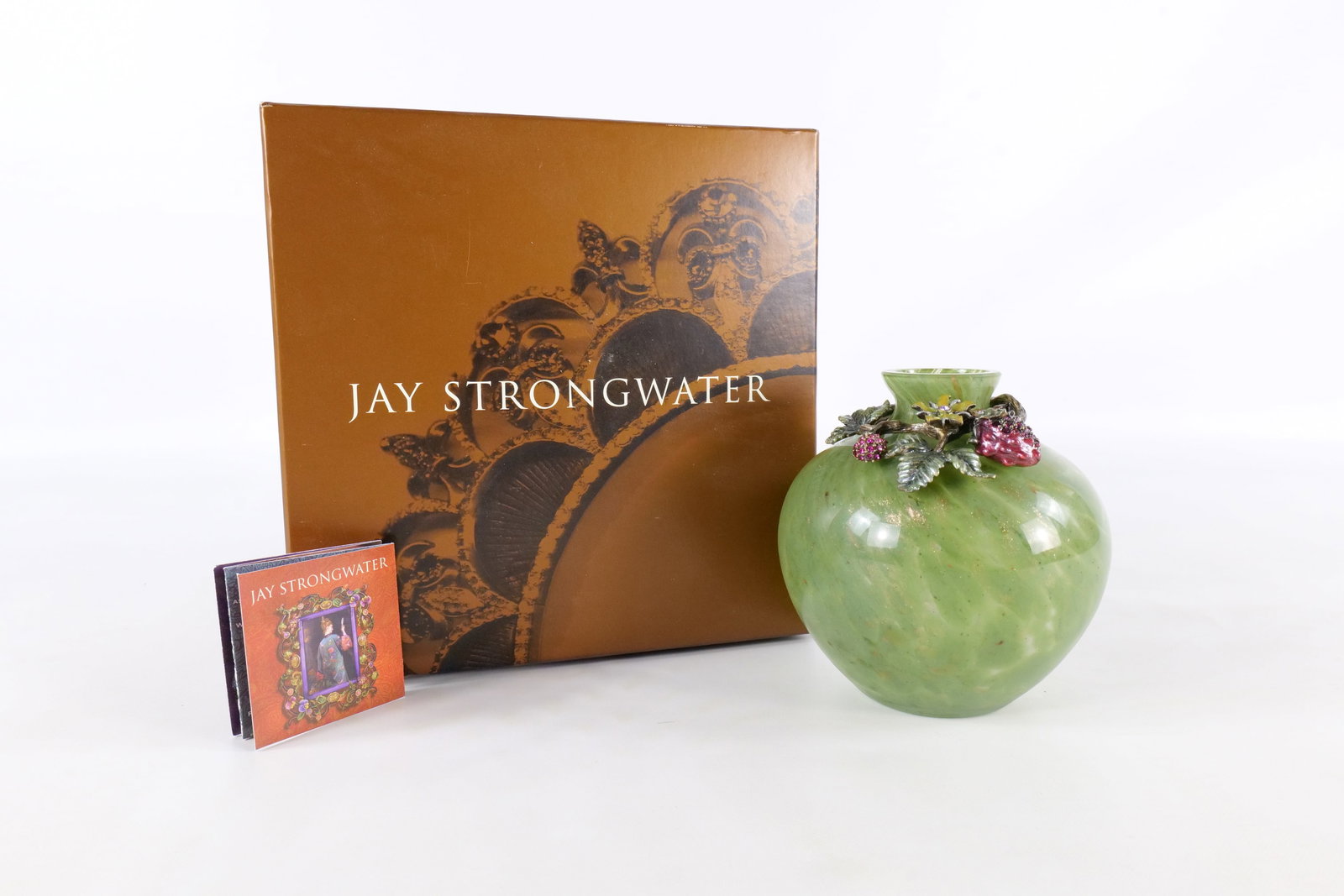 Jay Strongwater Strawberry Green Glass Bud Vase - Signed: Jay Strongwater strawberry green glass bud vase. Has an enameled strawberry vine done in reg, green and brown tones with corresponding rhinestone accents at the neck of the green glass bud vase with s