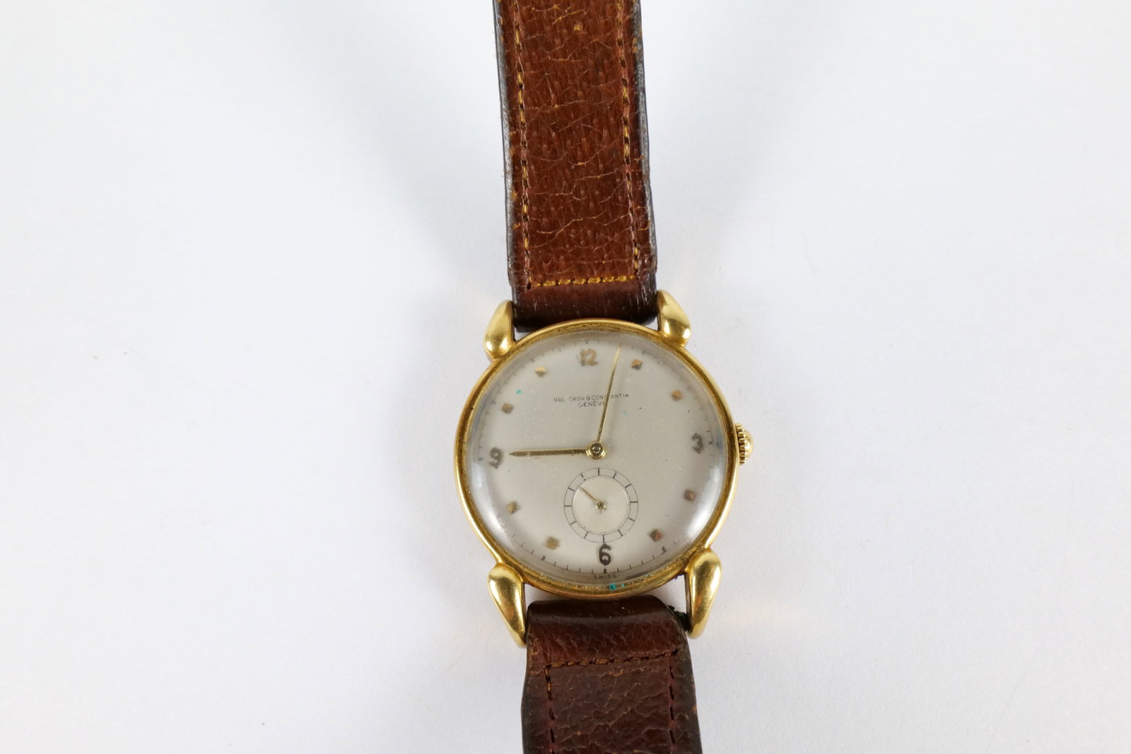Vintage Vacheron & Constantin 18K Gold Wristwatch: Vintage Vacheron & Constantin 18K yellow gold men's wrist watch. Circa late 1940's. Movement number 488093. Case number 290555. Manual wind movement. Silvered dial with applied Arabic an faceted pyram