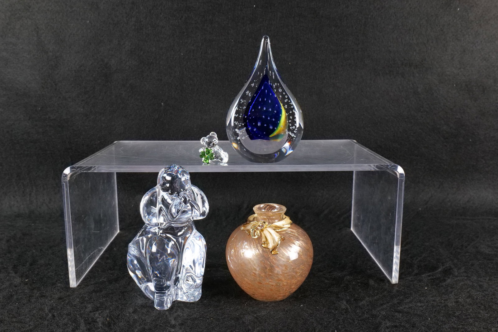 Group of Art Glass: Group lot of art glass items including an art glass tear drop bubble control paperweight - artist signed - undetermined. Art glass bud vase with enameled and jeweled ribbon decoration. Either Jay Stro