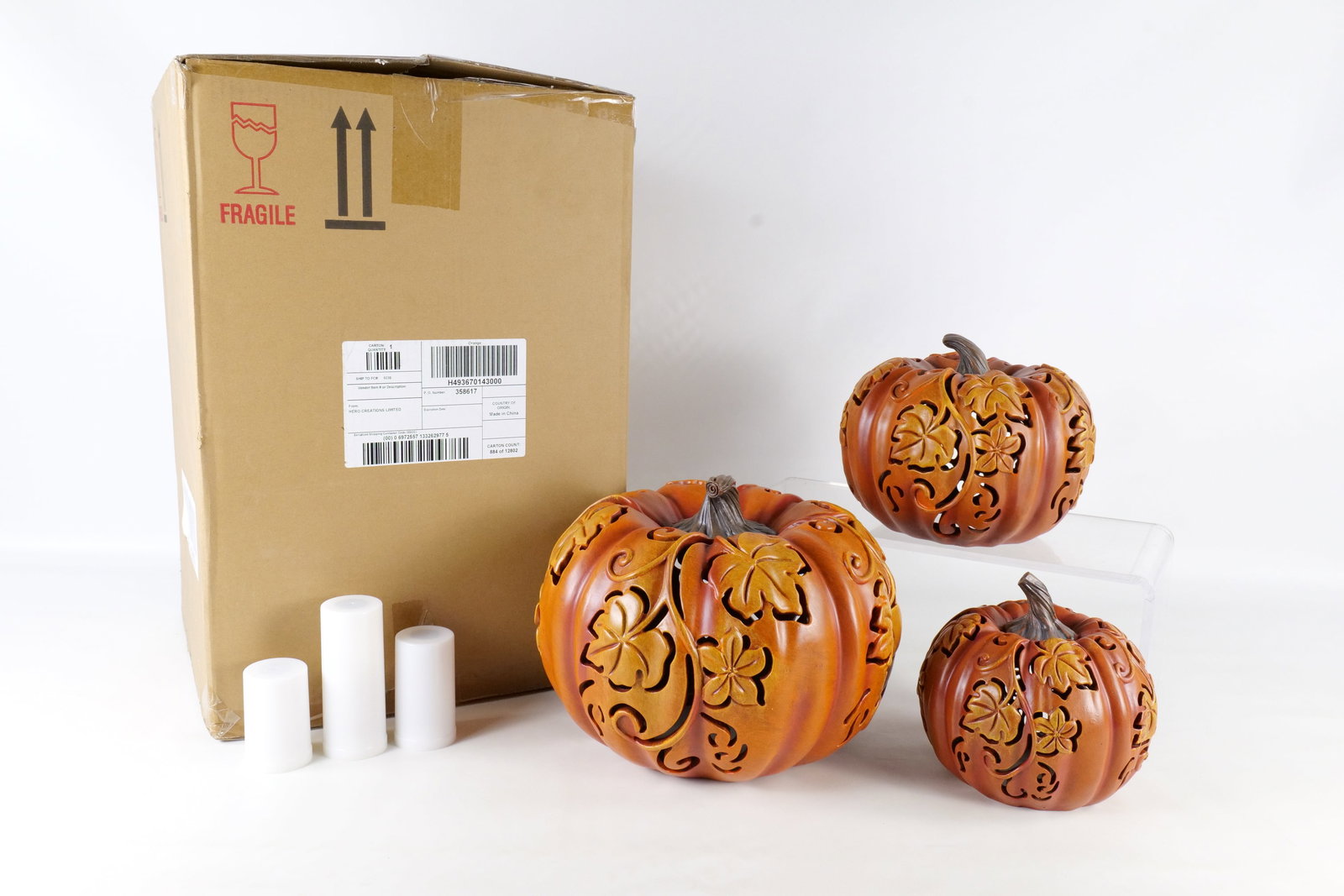 3 Resin Pumpkins: Group of 3 resin light up pumpkins with leaf cut outs by Valerie. Largest measures 11" in diameter. With box. All invoices must be paid within 24 hours of the sale. We offer multiple shipping options,