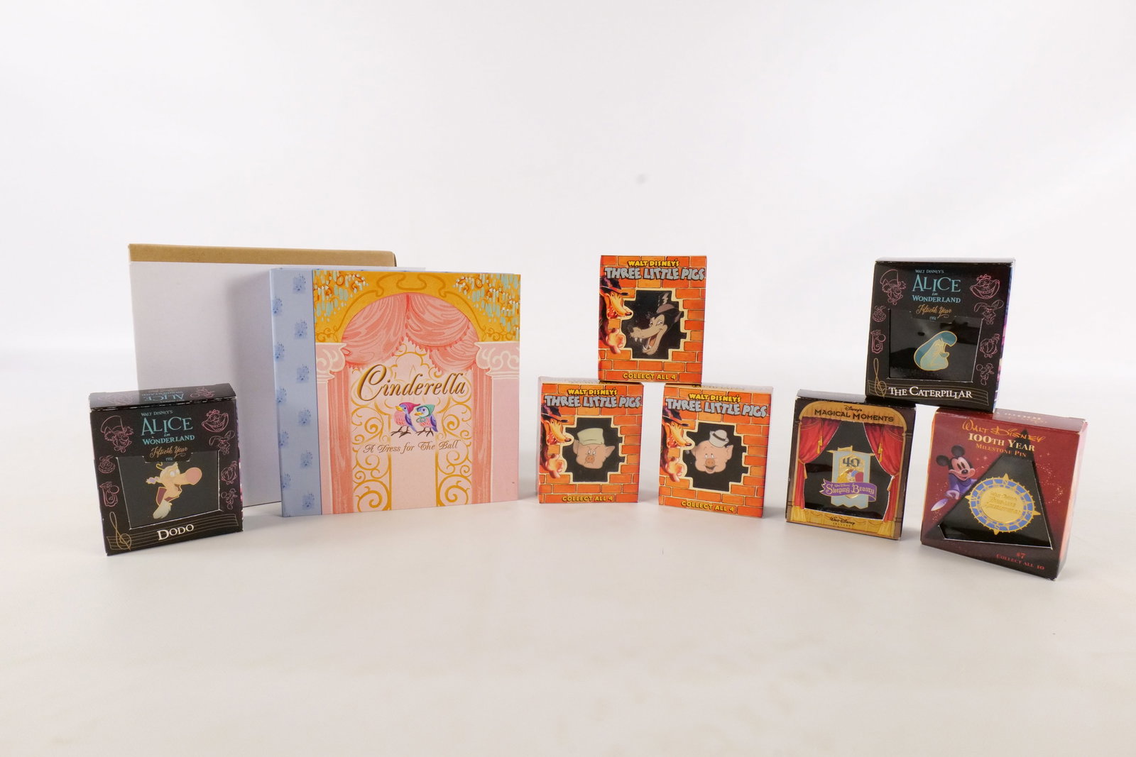Lot of 8 Disney Pins: Lot of 8 Disney Pins. Including Cinderella - A Dress for the Ball - Disney Storybook Collection Pin, Three Little Pigs 70th Anniversary - Fifer, Practical, and Big Bad Wolf, Magical Moments - Sleeping