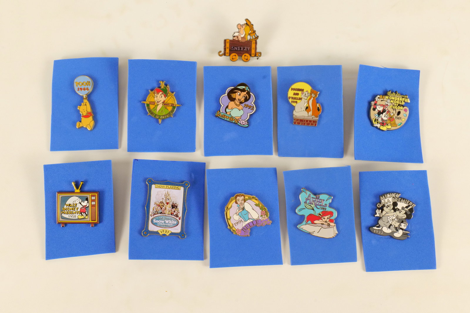 Lot of 11 Disney 100 Years of Dreams Pins: Lot of 11 Disney 100 Years of Dreams Pins. Including Belle, Ariel, Jasmine, Snow White and the Seven Dwarfs Poster, Sneezy in Mine Cart, Winnie the Pooh, Wonderful World of Color, Duchess & O'Malley, 