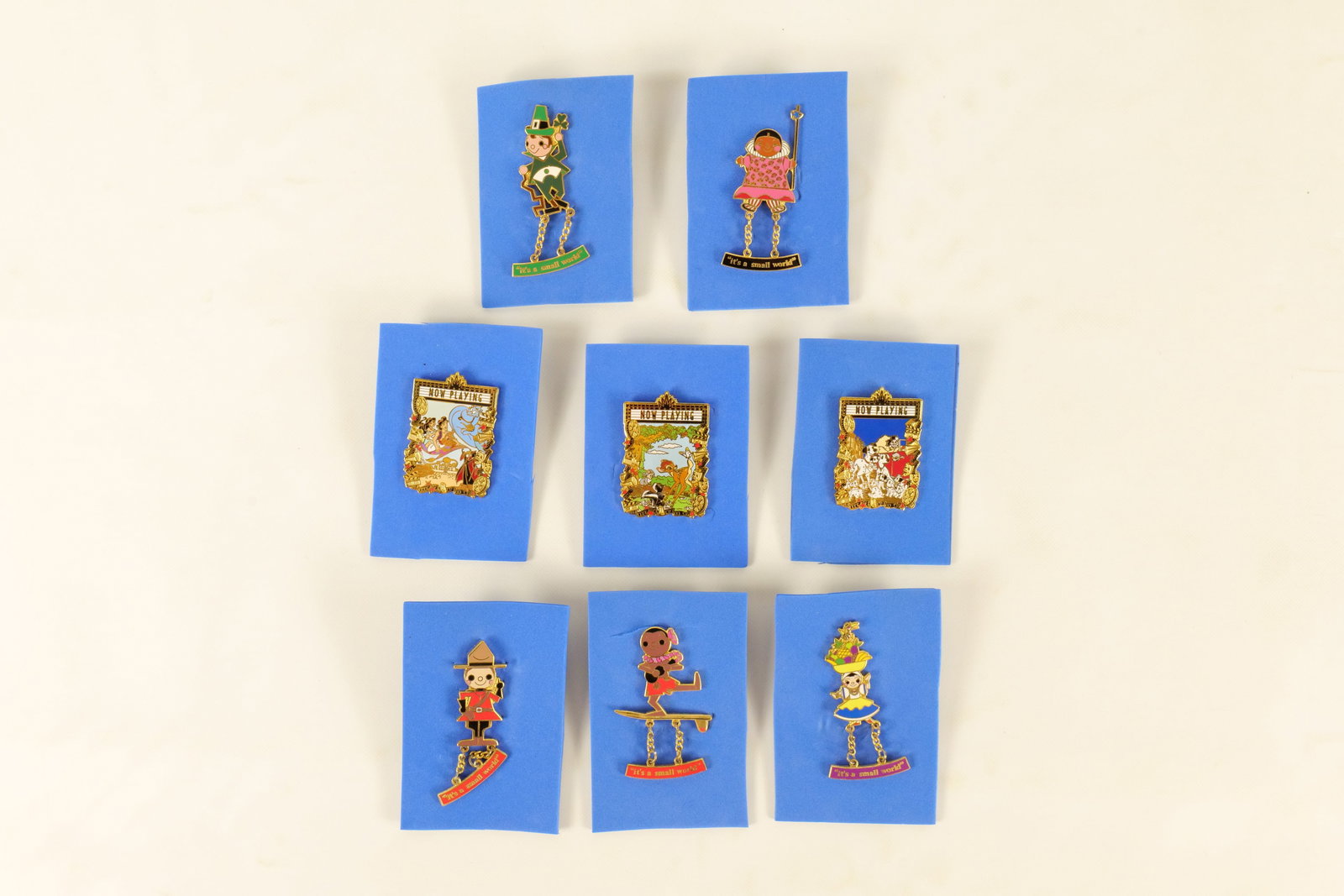 Lot of 8 Disney Pins: Lot of 8 Disney Pins. Including 3 "Now Playing" Pins and 5 Small World Dangle Pins. All invoices must be paid within 24 hours of the sale. We offer multiple shipping options, please read the shipping 