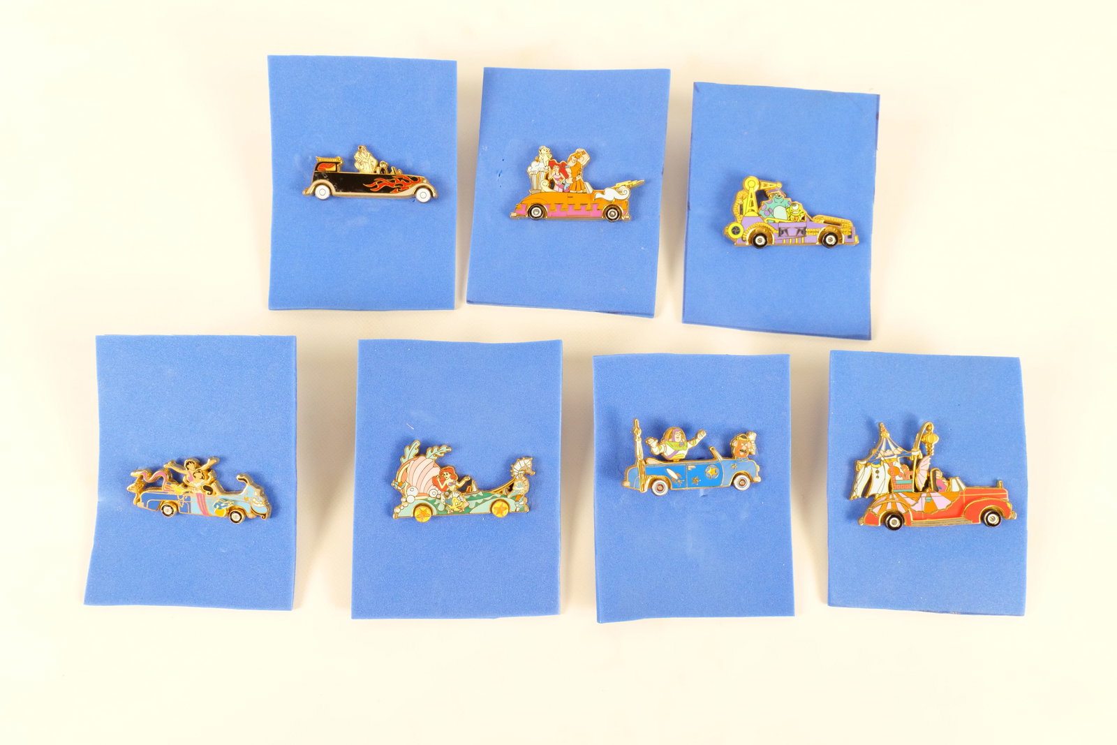 Lot of 7 Disney Stars & Motor Cars Parade Pin Lot: Lot of 7 Disney Stars & Motor Cars Parade Pin Lot. Including The Little Mermaid, Toy Story, 101 Dalmatians, Monsters Inc., Aladdin, Mulan, and Hercules. All invoices must be paid within 24 hours of th