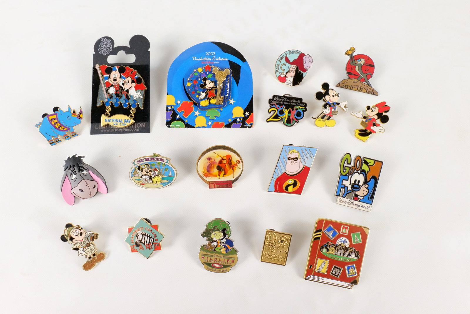 Lot of 18 Disney Trading Pins: Lot of 18 Disney Trading Pins. Including Limited Edition National Day, Eeyore Rubber Face, 2003 Passholder Exclusive, Animal Kingdom Camp Zebra, Celebrate the Future, Illuminations Passport, Incredibl