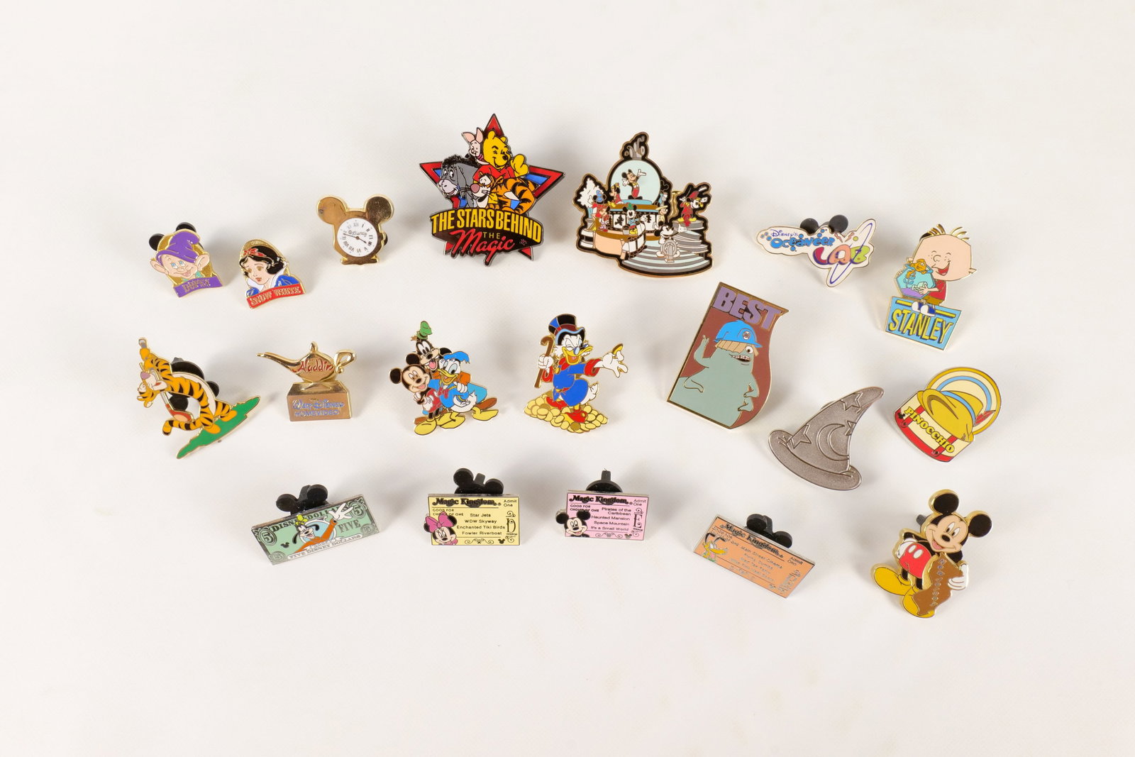 Lot of 19 Disney Trading Pins: Lot of 19 Disney Trading Pins. Including Winnie the Pooh and Friends, Disney Characters on Stairs/Stage, Ticket Stubs, Best Character Pin, Sorcerer Hat, Pinocchio, Scrooge, Mickey New Jersey, and More