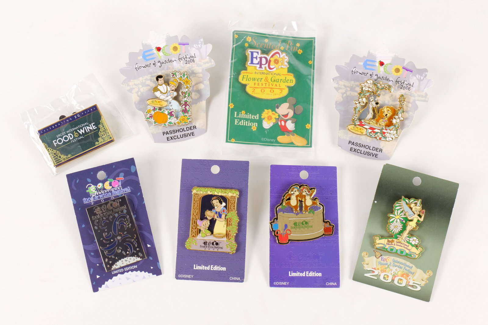 Lot of 8 Epcot "Festival" Pins: Lot of 8 Epcot "Festival" Pins. Including Food and Wine Festival and Flower and Garden Festival. 6 are Exclusive/Limited. All are on card backs or sealed. All invoices must be paid within 24 hours of 