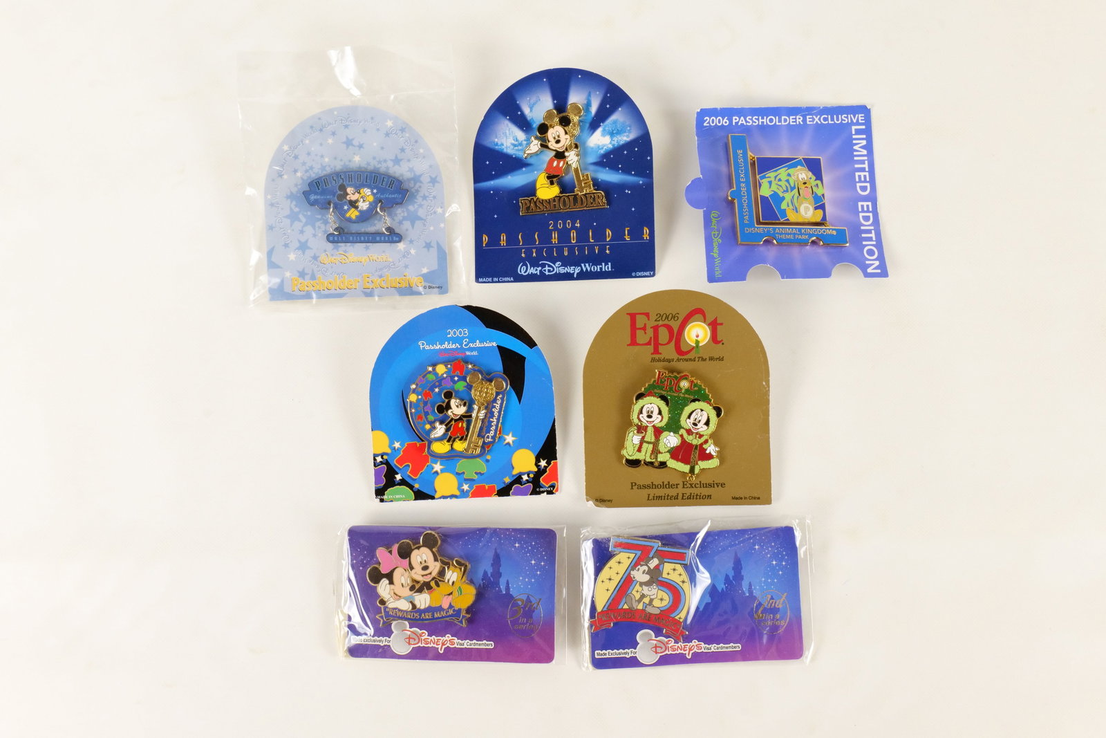 Lot of 7 Disney Exclusive Pins: Lot of 7 Disney Exclusive Pins. Including Card Holder and Pass Holder. All come with card backs. All invoices must be paid within 24 hours of the sale. We offer multiple shipping options, please read 