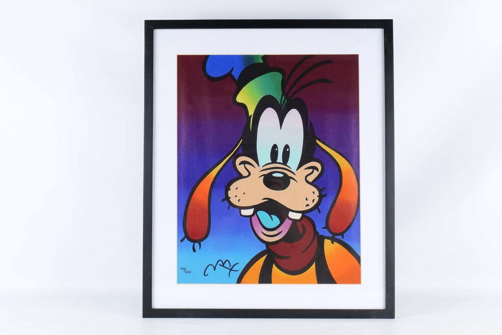 Peter Max Goofy Framed Giclee Print on Canvas: Peter Max Goofy Framed Giclee Print on Canvas. Numbered 160 out of 500 . Signed in the plate - facsimile print. Measures 25 1/4 inches tall by 21 1/4 inches wide. All invoices must be paid within 24 h