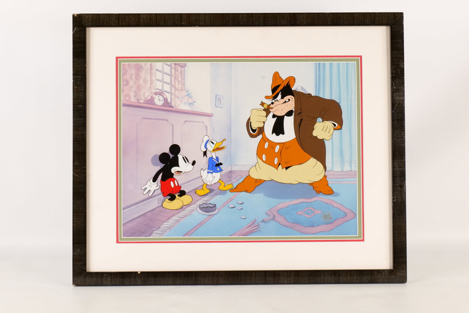 Moving Day Walt Disney Hand Painted Character Cel: "Moving Day" Walt Disney Hand Painted Character Cel. Depicting Mickey Mouse, Donald Duck, and Peg Leg Pete. From The Disney Villains Volume One Commemorative Edition. Dated 1989. Limited edition out o
