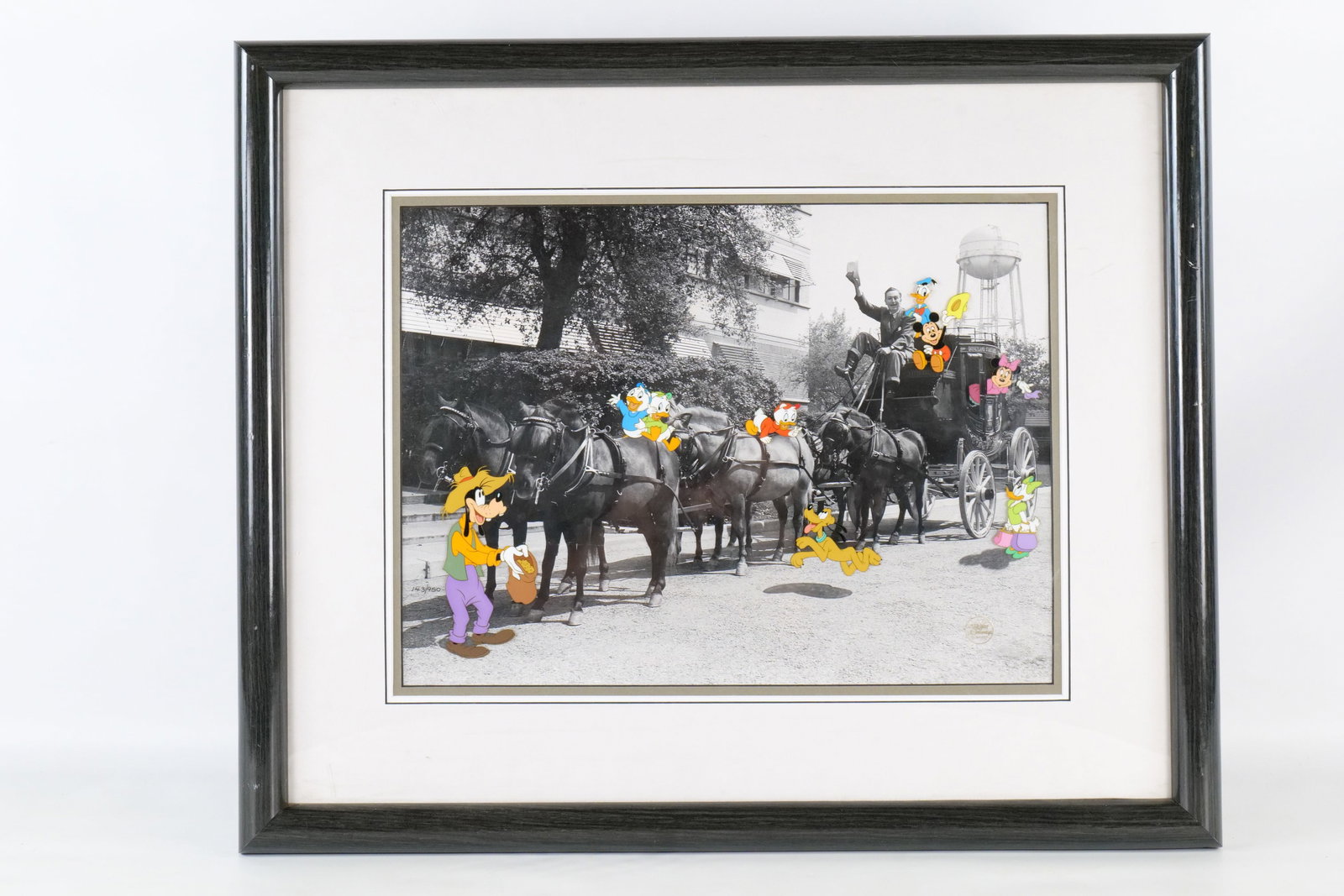 Walt's Stagecoach Hand Painted Limited Edition Disney Animation Cel: Walt's Stagecoach Hand Painted Limited Edition Disney Animation Cel. Features Mickey Mouse, Minnie Mouse, Donald, Daisy, Goofy, Pluto, Huey, Dewey, and Louie. Dated 1993. Numbered 143 out of 950. Has 