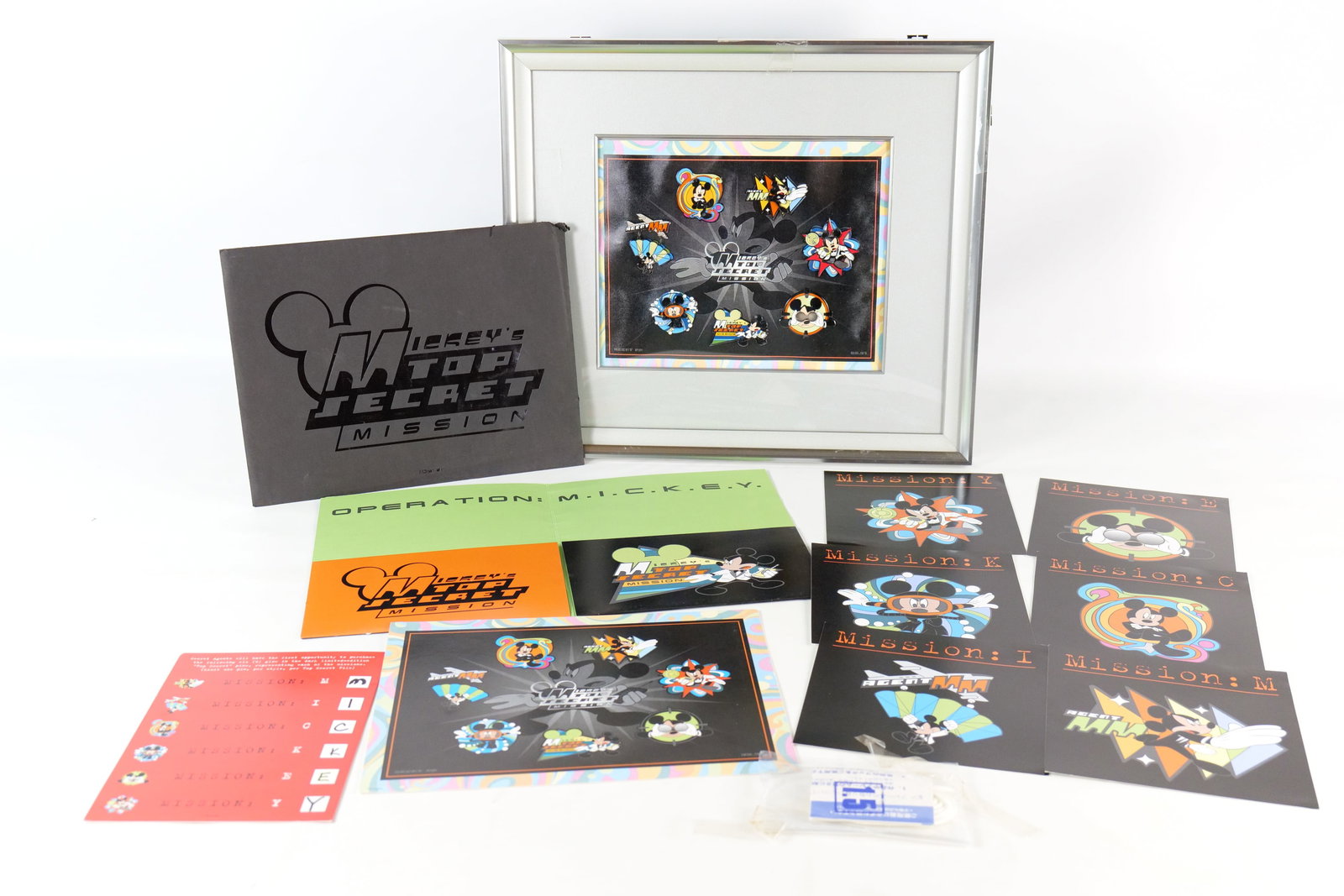 Mickey Mouse Top Secret Mission Limited Edition Frame Pin Set: Mickey Mouse Top Secret Mission Limited Edition Frame Pin Set. Believed to be from Disneyland Tokyo. Comes with extra Mickey card for display and MICKEY top secret file cards. Also comes with a string