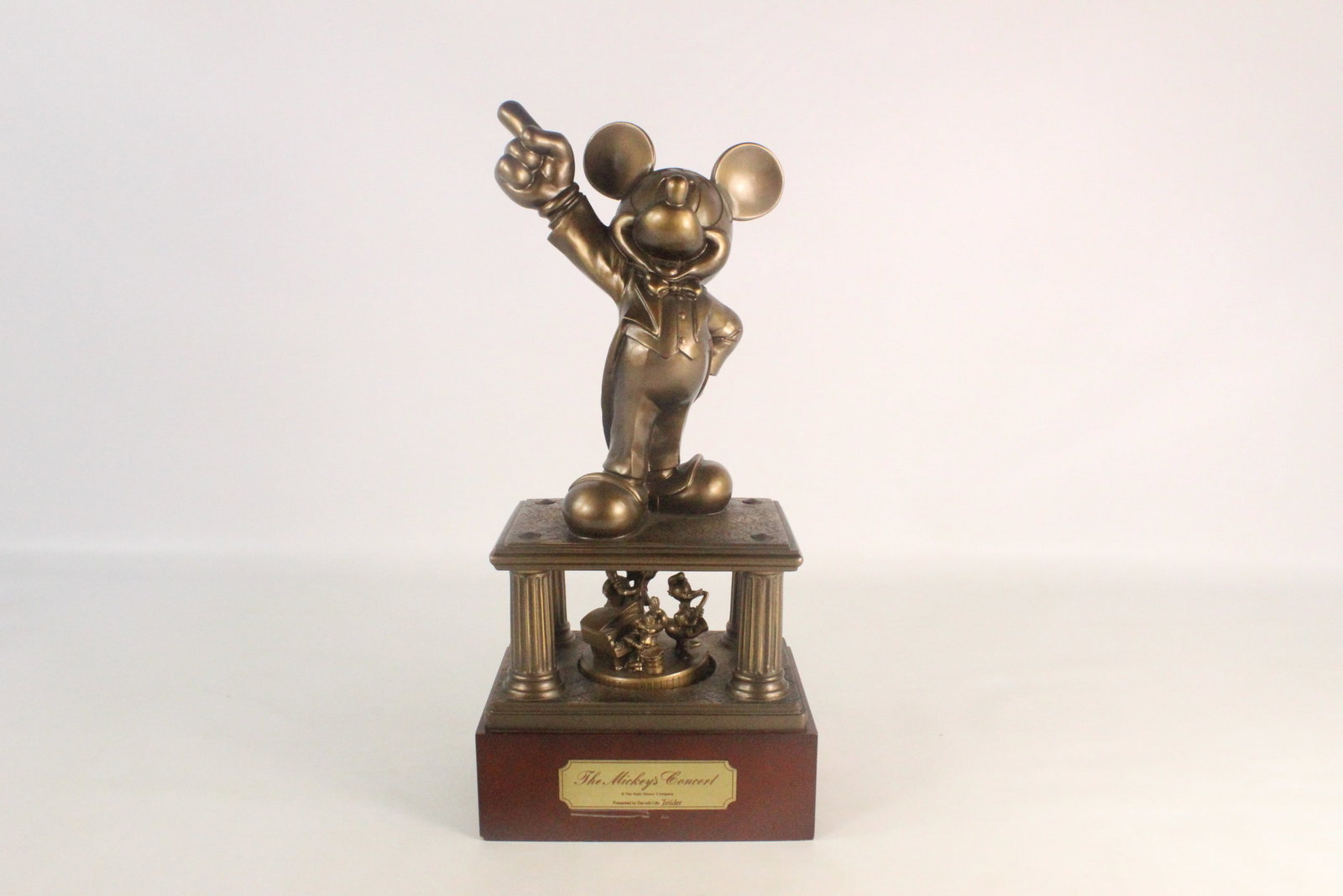 Disney "The Mickey's Concert" Bronze Tone Music Box Statue: Disney "The Mickey's Concert" Bronze Tone Music Box Statue. Rare Dai-Ichi Life Insurance Promo Statue. Made in Japan. Tested and working. Measures 18 inches tall by 8 inches wide. All invoices must be