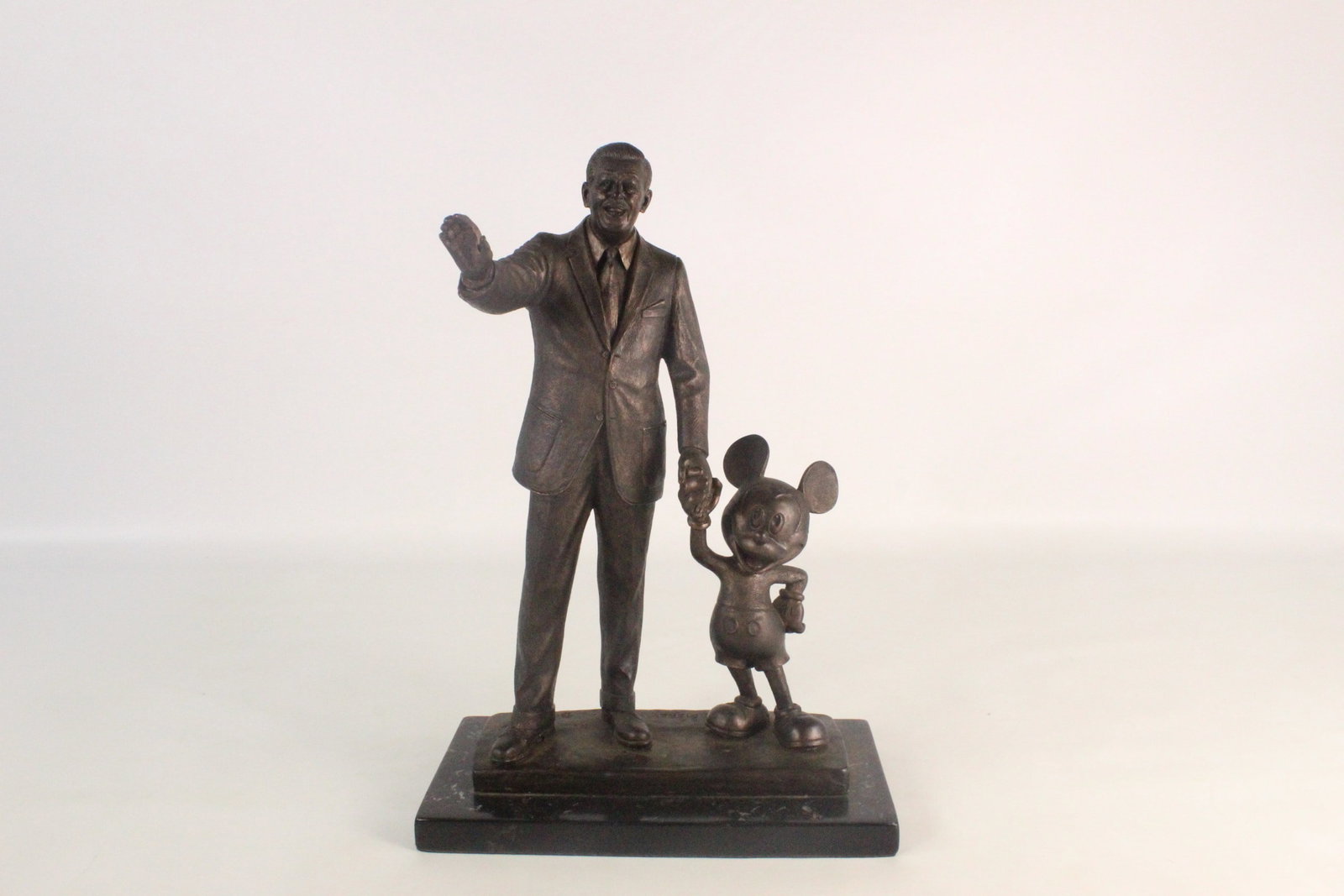 Walt Disney and Mickey Partners Cold Cast Bronze Statue: Walt Disney and Mickey Partners Cold Cast Bronze Statue. Replica of Blaine Gibson's statue. Signed B. Gibson in the cast. Comes on Marble base. Measures 15 inches tall by 10 inches wide. All invoices 