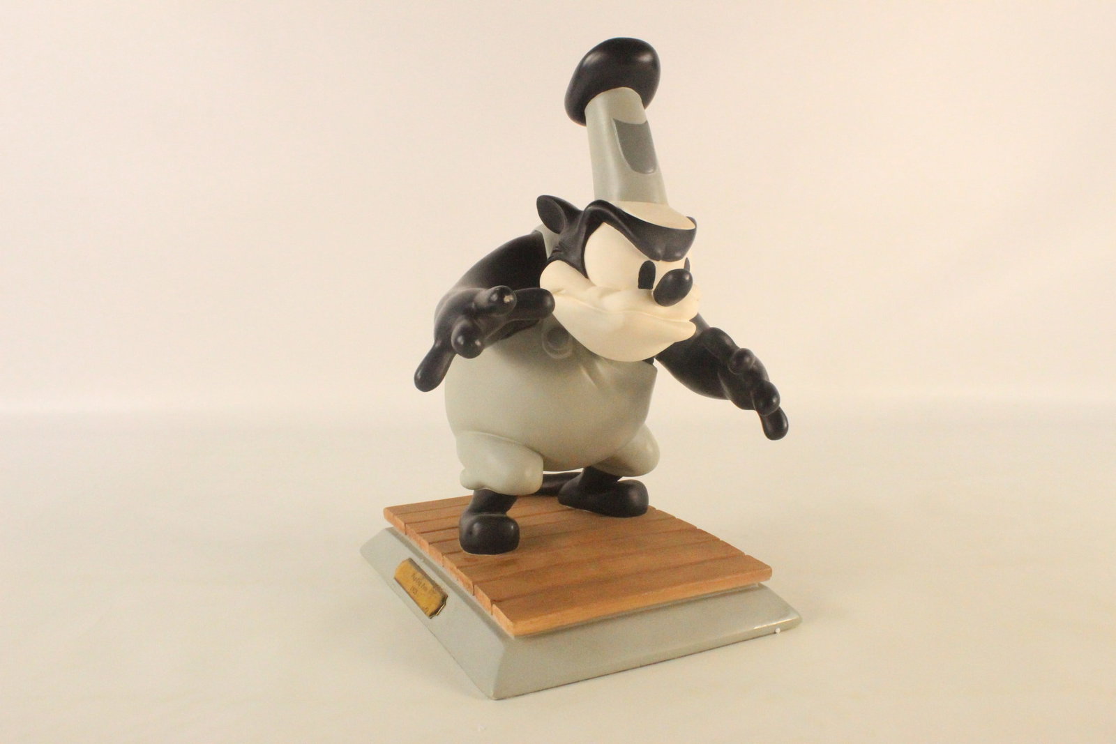 1997 Disneyana Convention Peg Leg Pete Resin Figurine: 1997 Disneyana Convention Peg Leg Pete Resin Figurine. Signed on back by artist Marc Delle. Limited to 1000 Pieces. There is some glue residue where the nameplate has previously come off. There is als